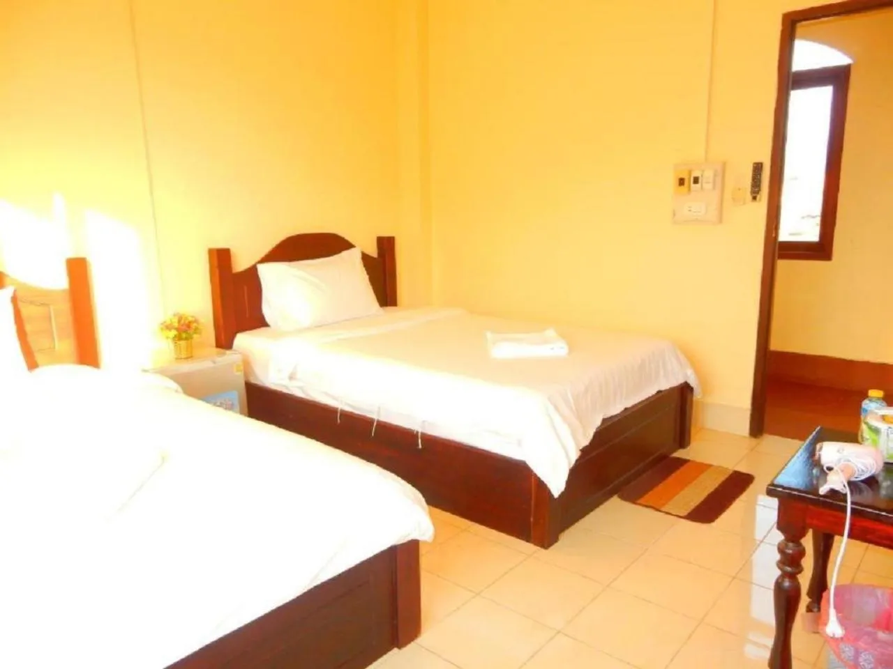 Photo of the whole room, Bed in Vang Vieng Camellia Hotel