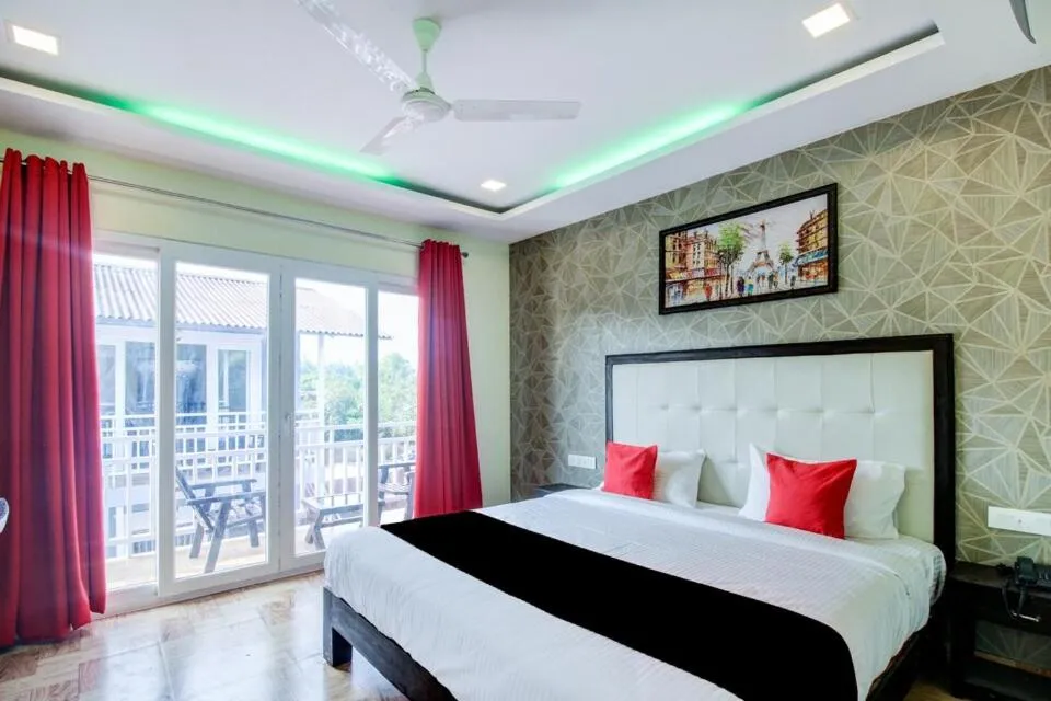 Bedroom, Bed in Sea Shell Beach Cottages & Suites