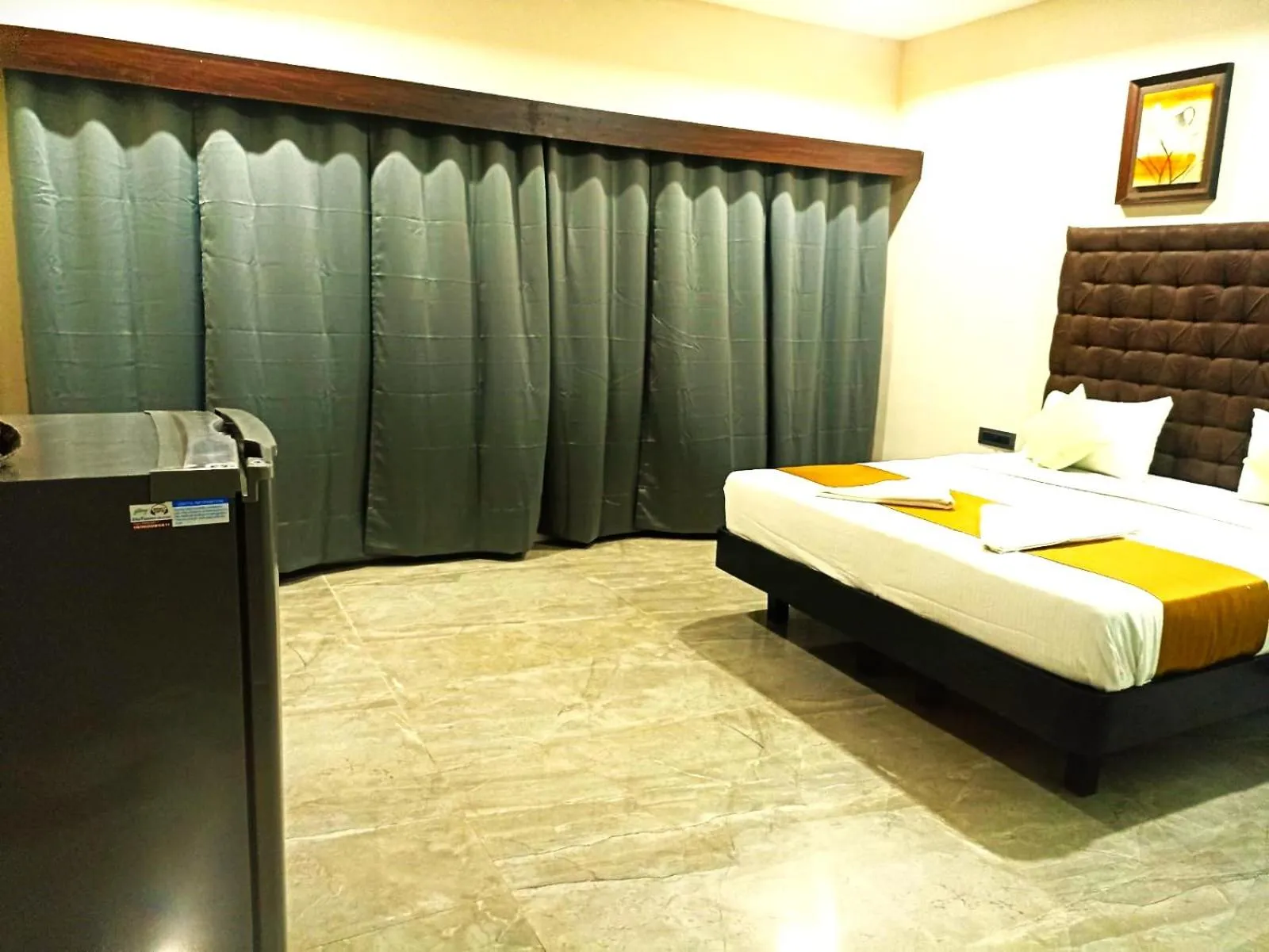 Bed in Sea Shell Beach Cottages & Suites