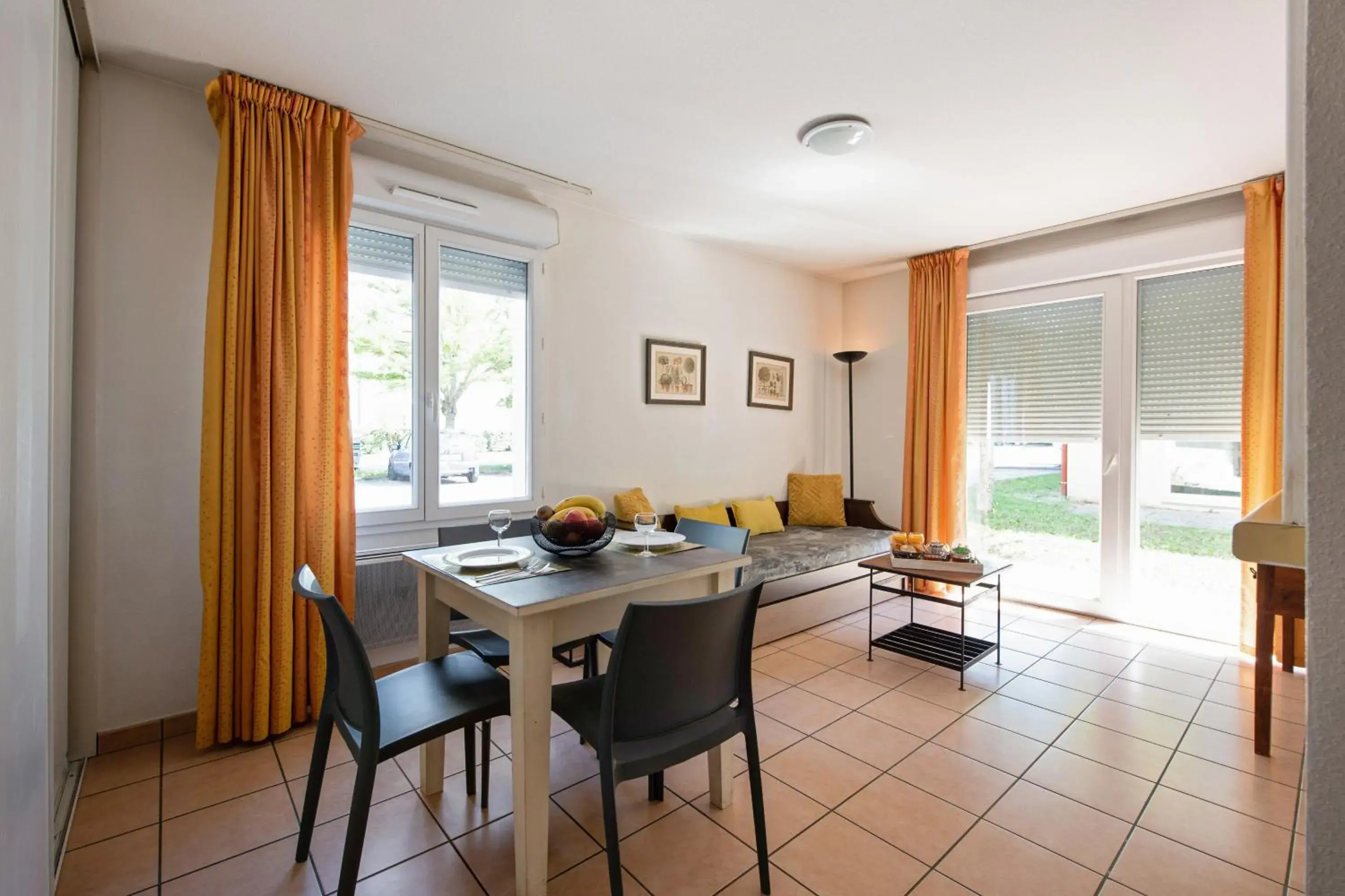 Living room in Appart'City Classic Dijon - Toison D'Or Living room in Appart'City Classic Dijon - Toison D'Or