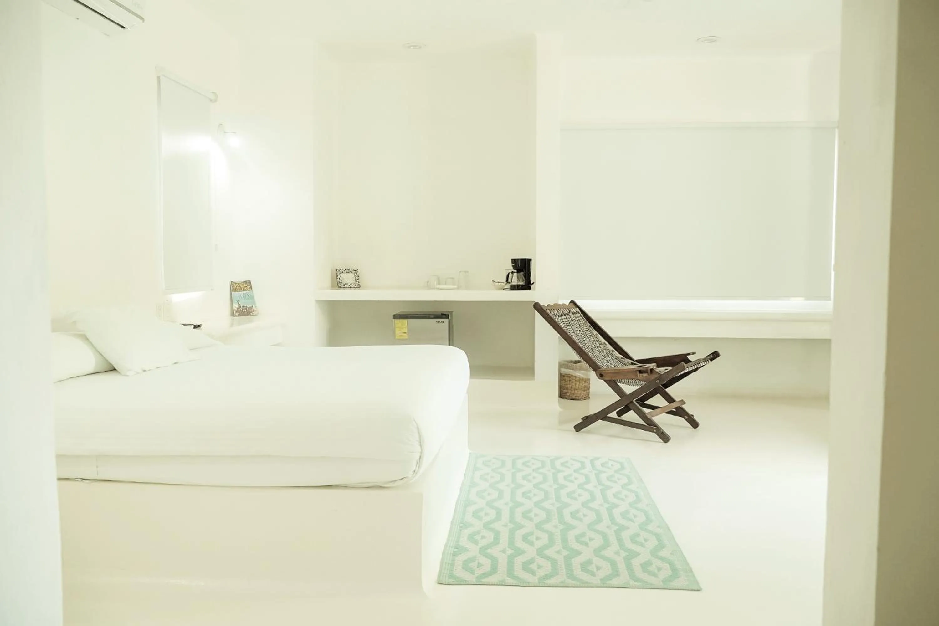 Bed in Royal Palm Bacalar Cabañas & Lagoon Club