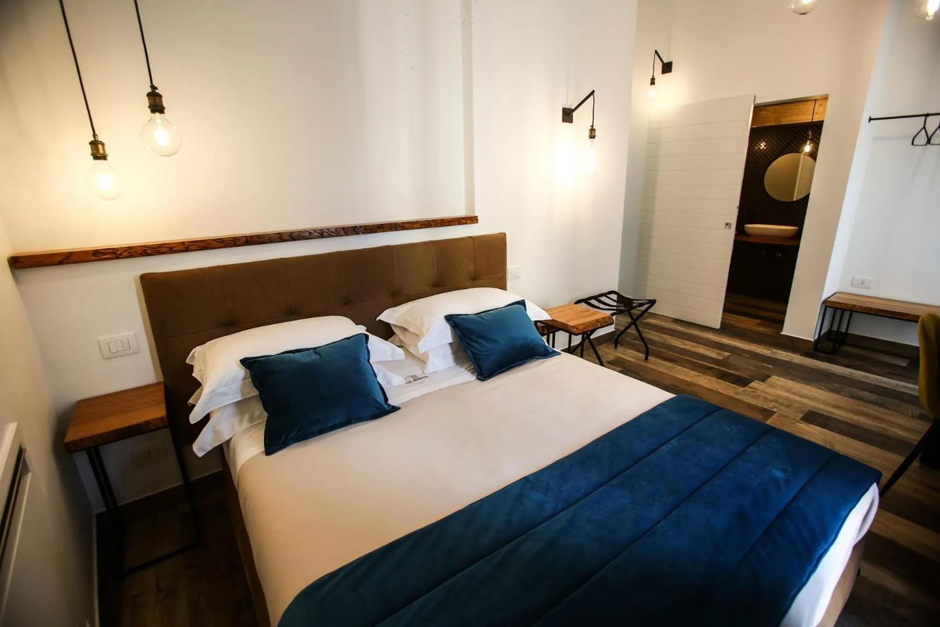 Bed in Luna Federiciana Luxury Room & Spa