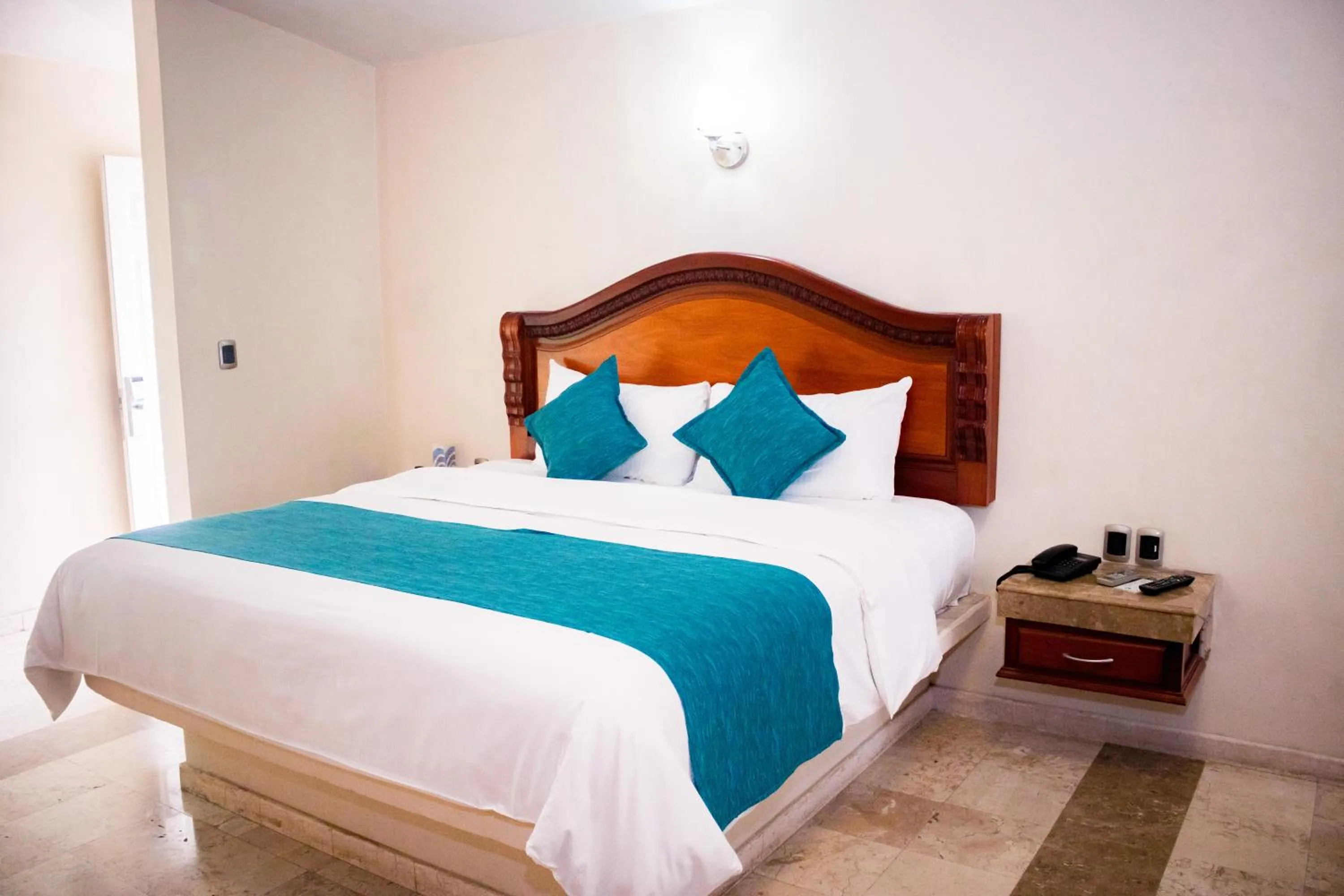 Bed in Hotel Aqua Spa & Resort