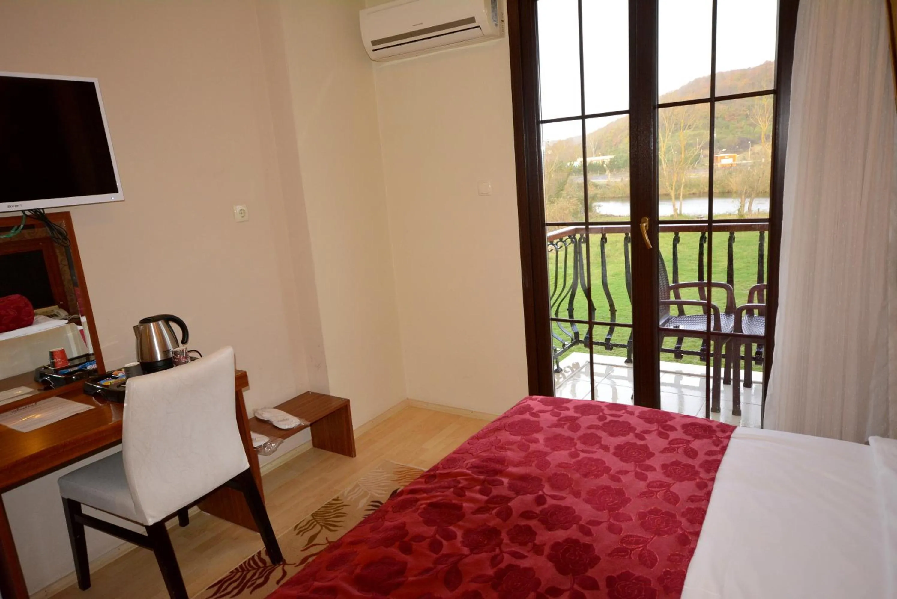 River view, Bed in Velena Hotel