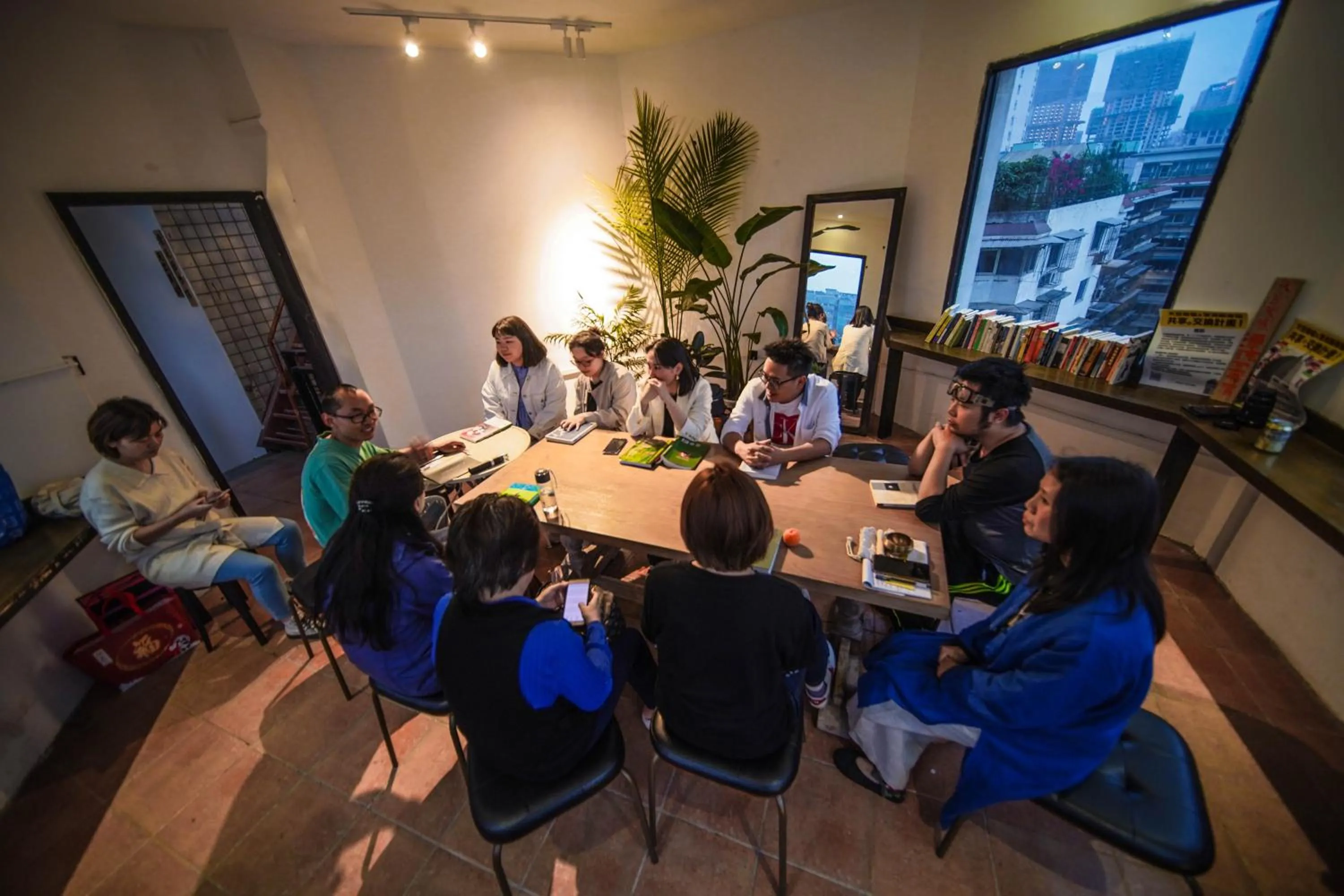 Seating area in Chengdu Local Tea Hostel - Short Walk To Taikooli - Chill & Social Coffee Lounge - Metro downstairs - Free Activities - Friendly English Speaking Staff - Tibet, Panda, Buddha & Snow Mountain Tours