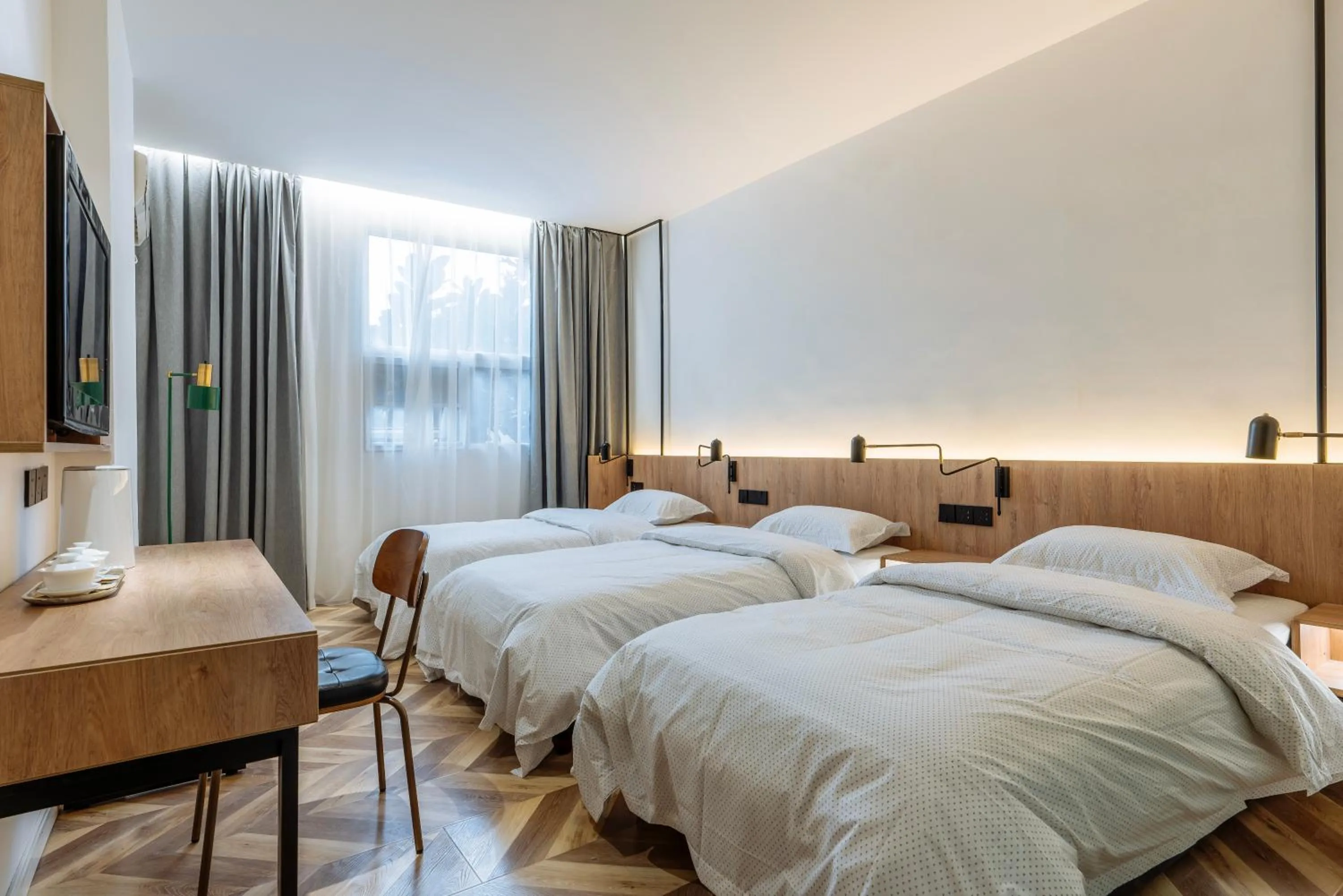 Photo of the whole room, Bed in Chengdu Local Tea Hostel - Short Walk To Taikooli - Chill & Social Coffee Lounge - Metro downstairs - Free Activities - Friendly English Speaking Staff - Tibet, Panda, Buddha & Snow Mountain Tours