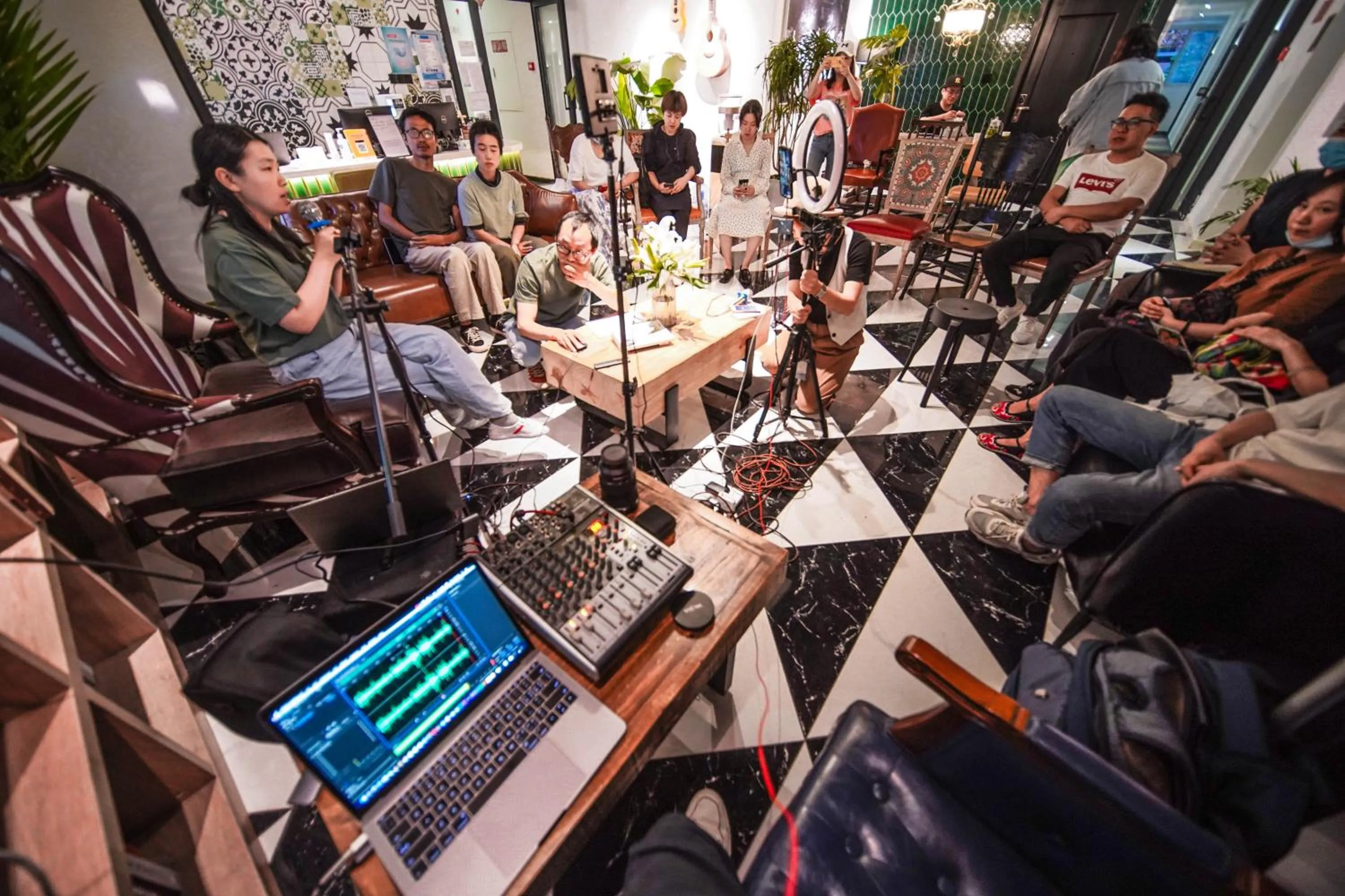 Communal lounge/ TV room in Chengdu Local Tea Hostel - Short Walk To Taikooli - Chill & Social Coffee Lounge - Metro downstairs - Free Activities - Friendly English Speaking Staff - Tibet, Panda, Buddha & Snow Mountain Tours