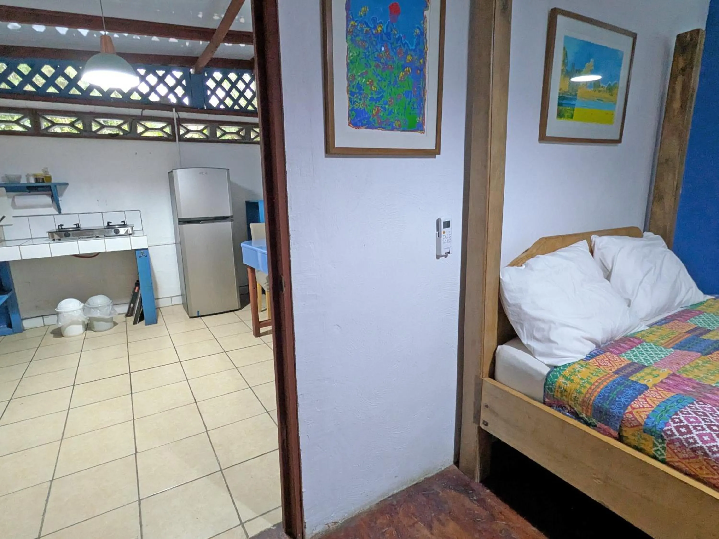 Bed in Tree House Beachfront Lodge