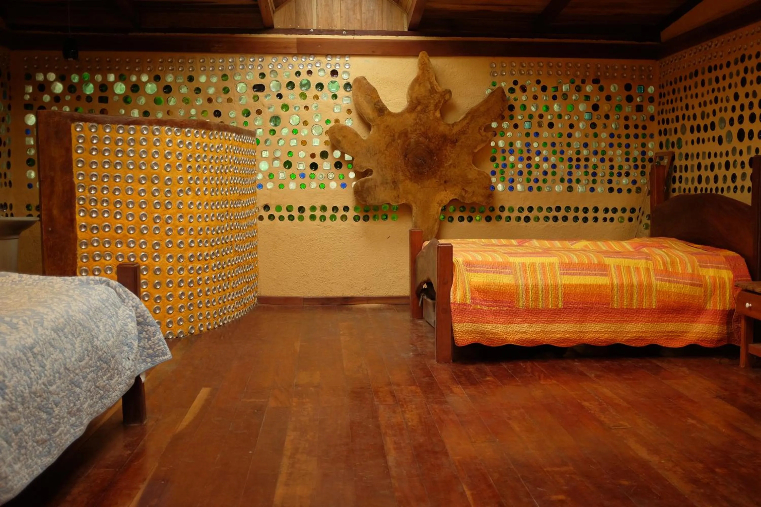 Bed in Tree House Beachfront Lodge