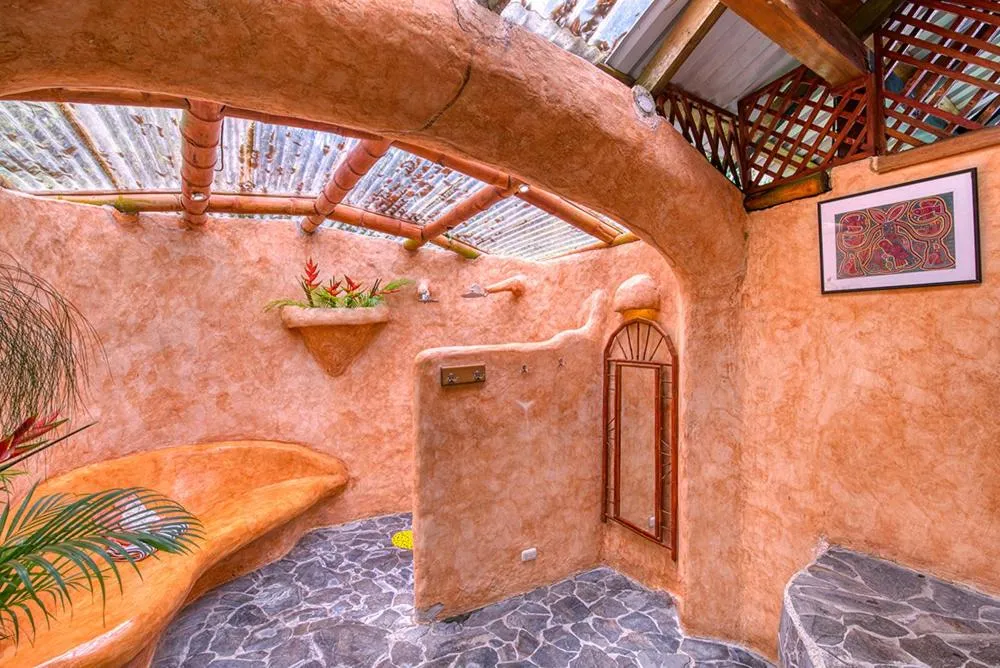 Bathroom in Tree House Beachfront Lodge