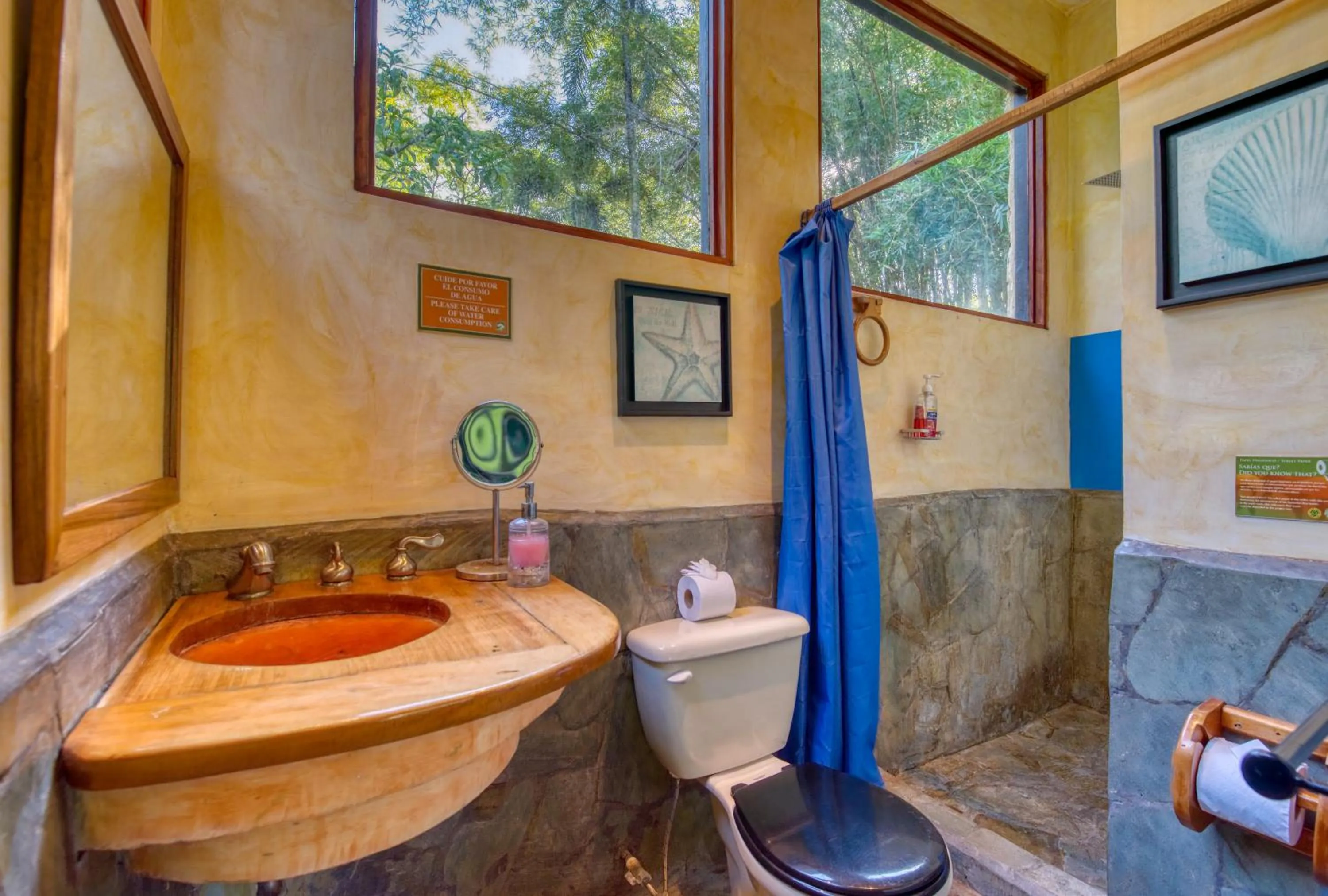 Toilet in Tree House Beachfront Lodge