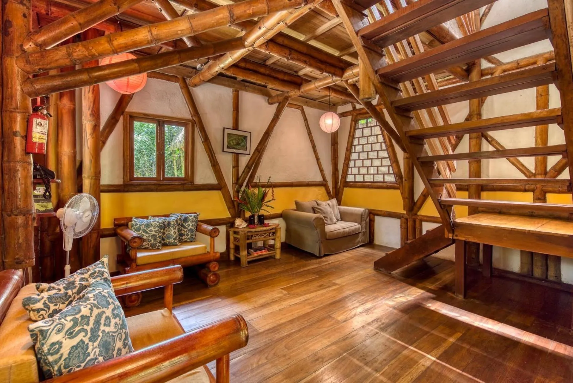 Seating area in Tree House Beachfront Lodge