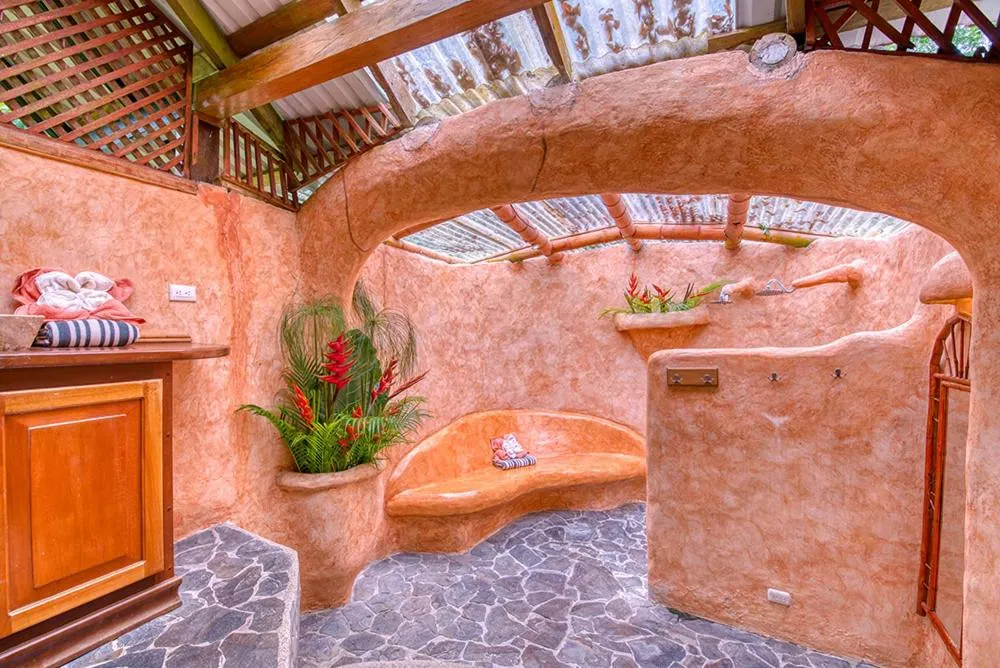 Bathroom in Tree House Beachfront Lodge