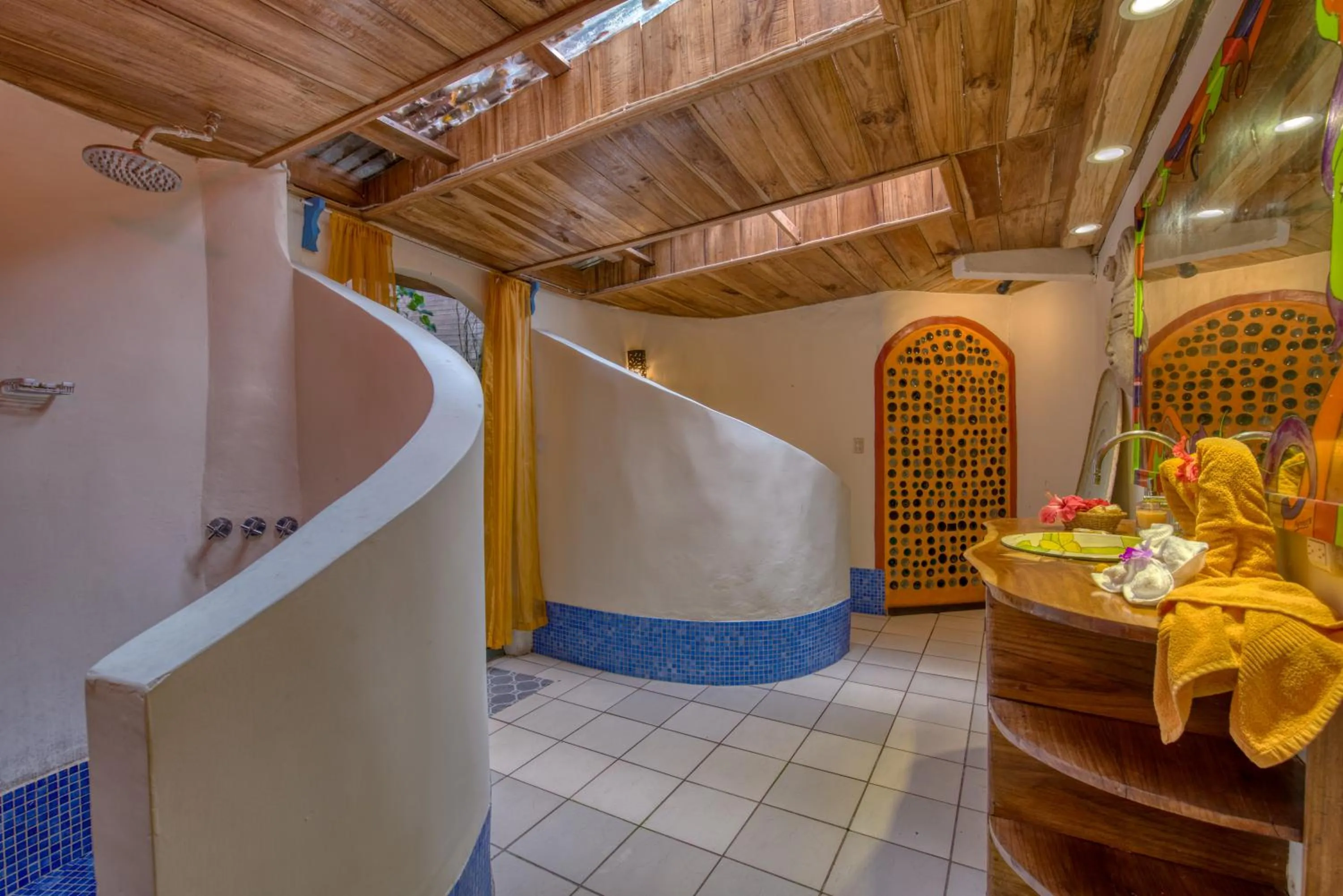 Bathroom in Tree House Beachfront Lodge