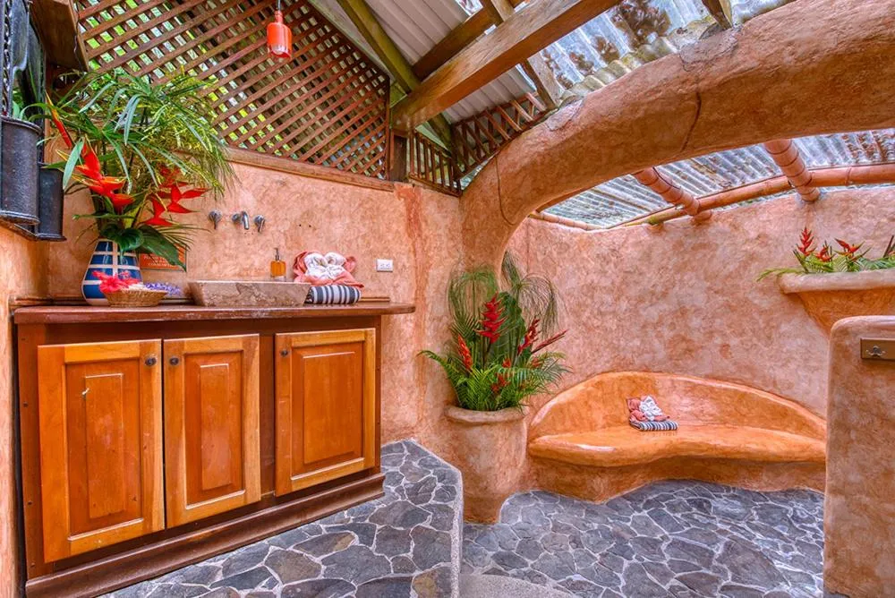 Bathroom in Tree House Beachfront Lodge