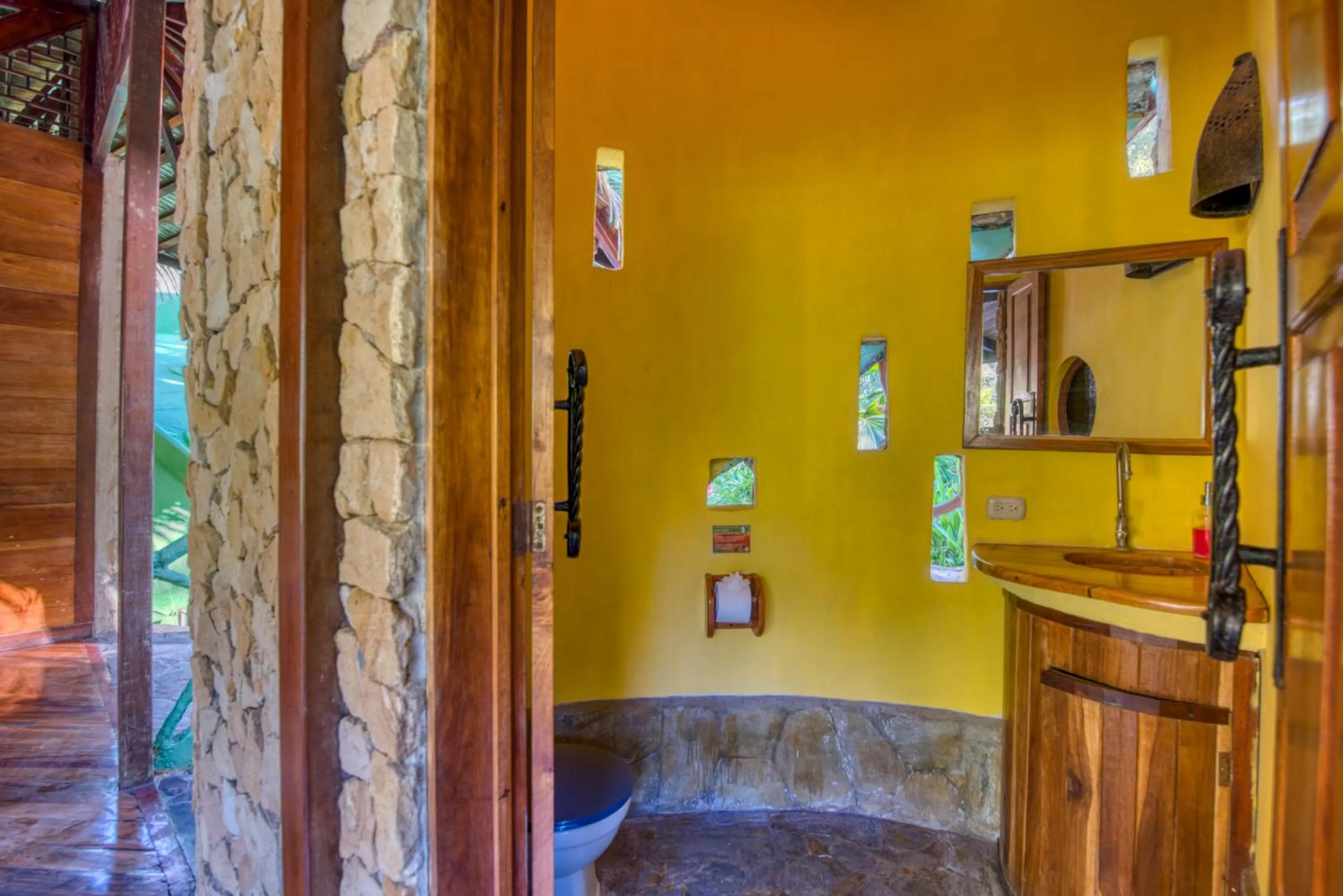 Bathroom in Tree House Beachfront Lodge