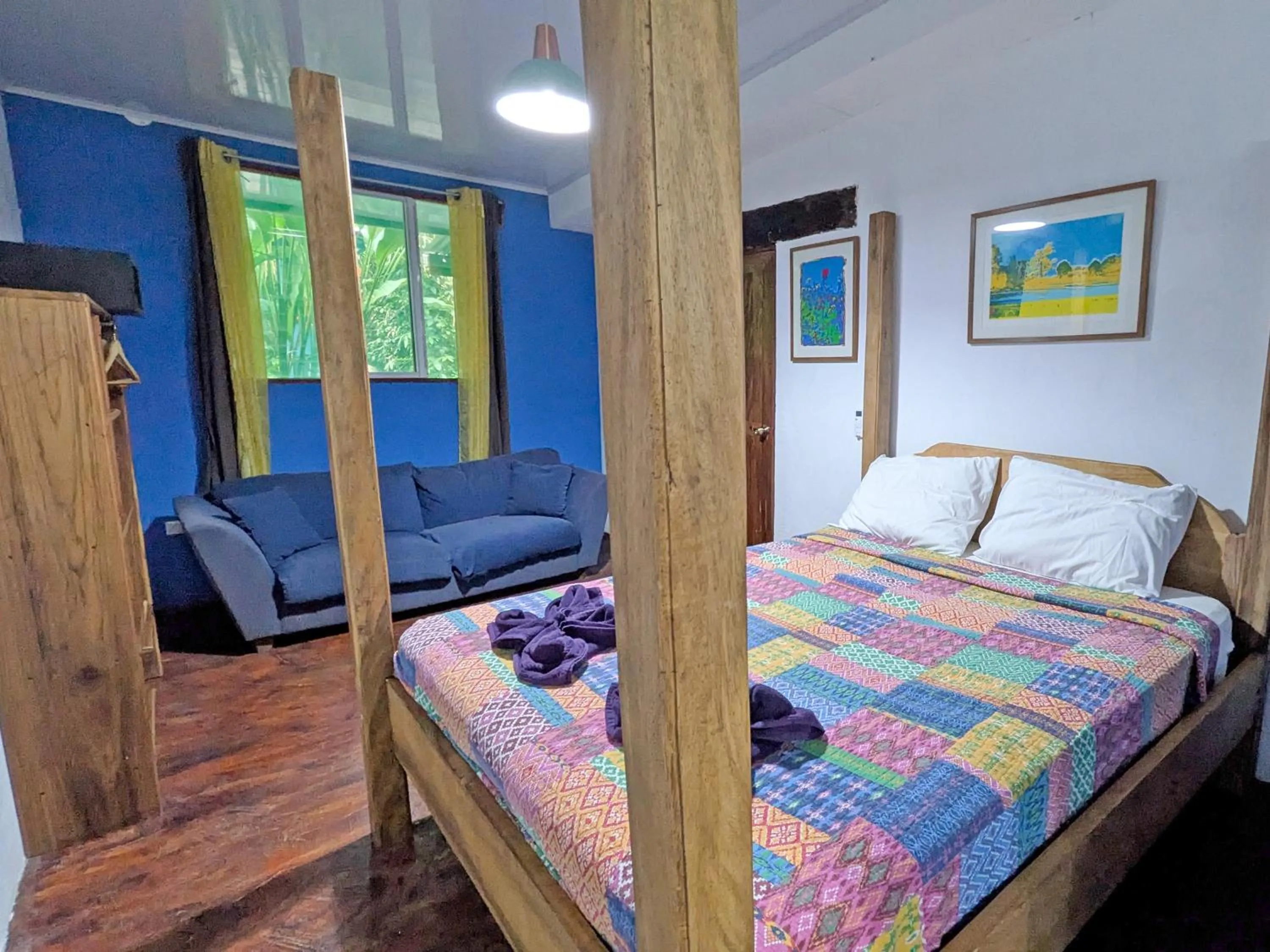 Bed in Tree House Beachfront Lodge