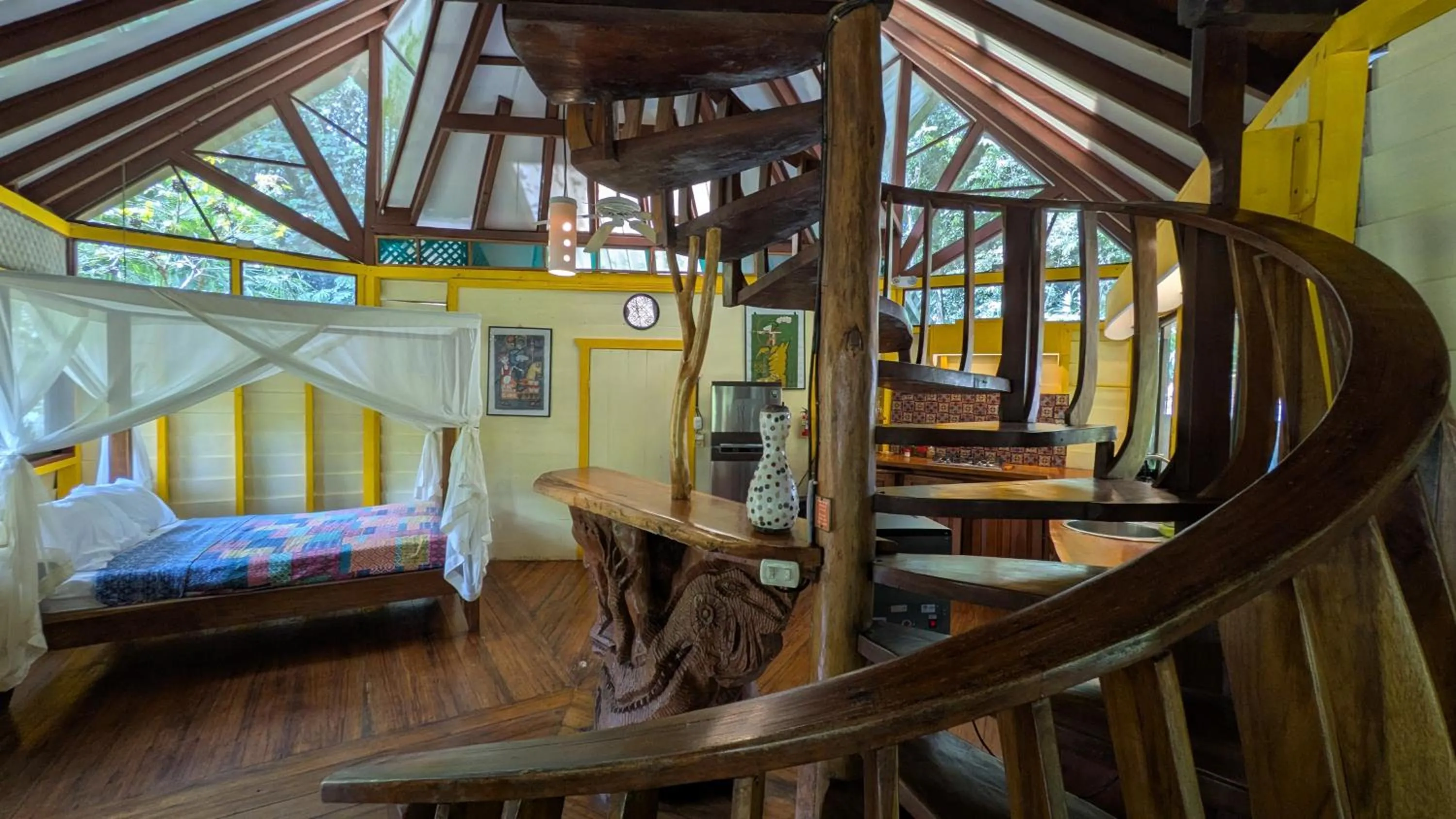 Living room, Bed in Tree House Beachfront Lodge