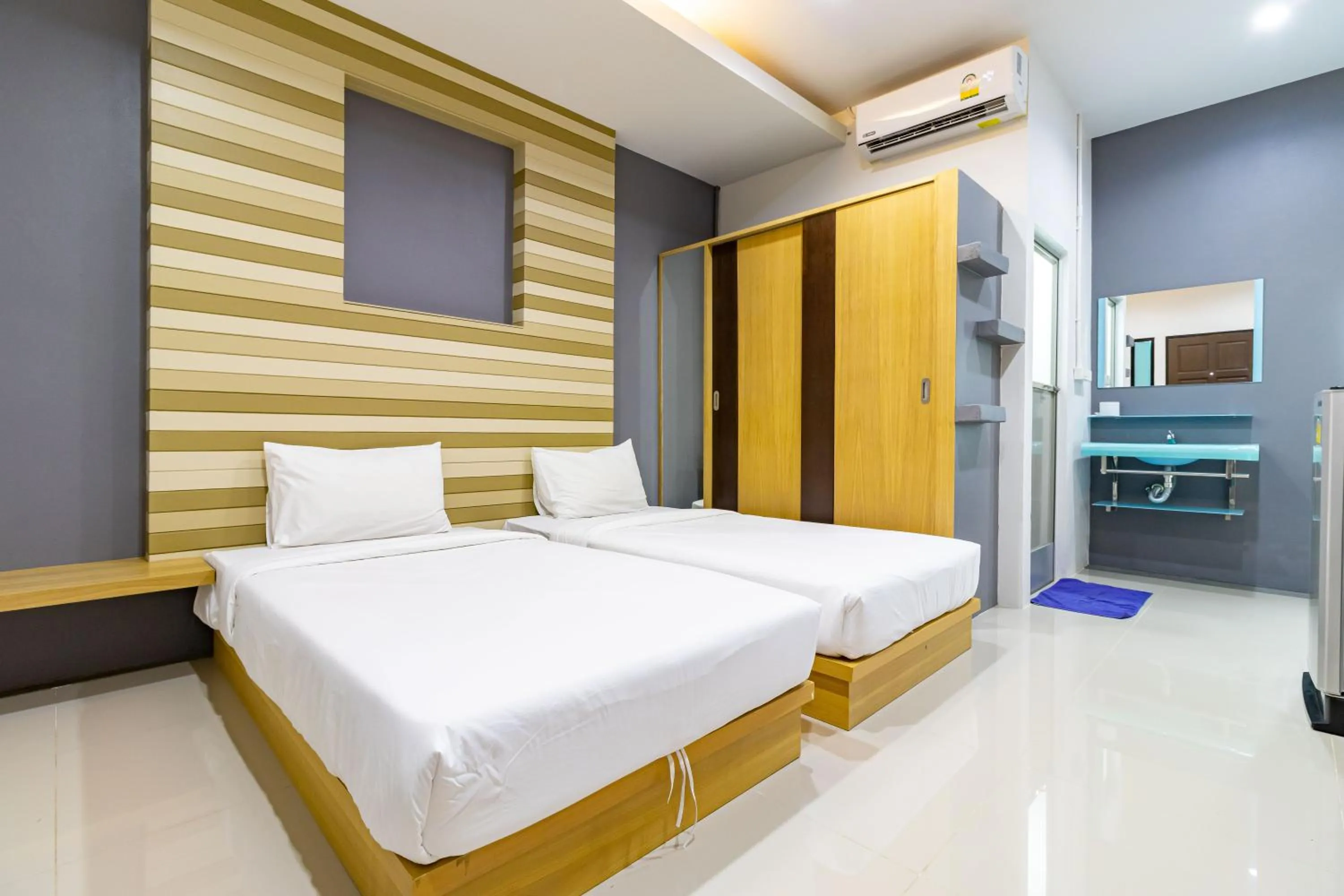 Bedroom, Bed in CS Klongtoey Grand Resort