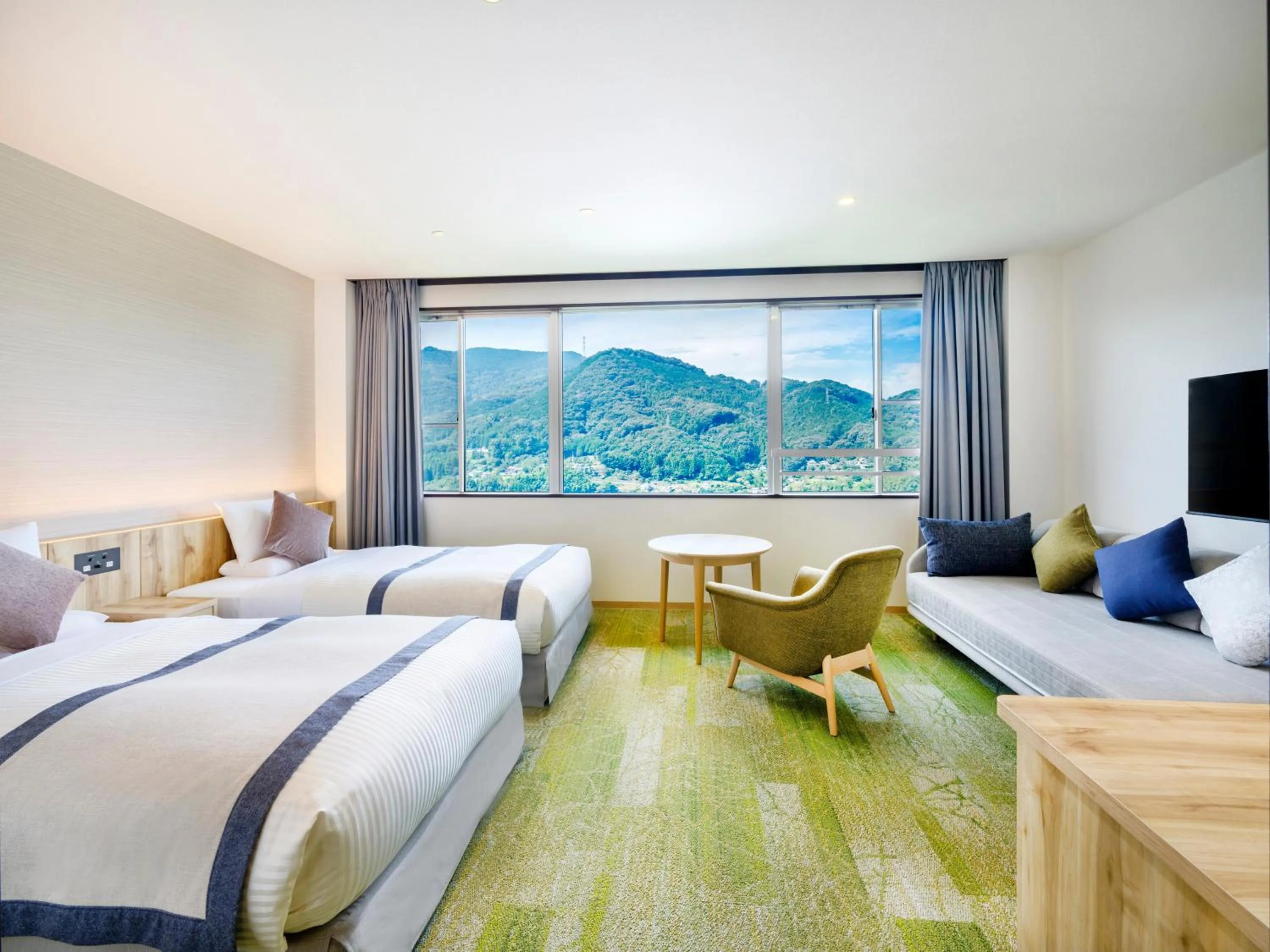 Bed in KAMENOI HOTEL Nagatoro Yorii