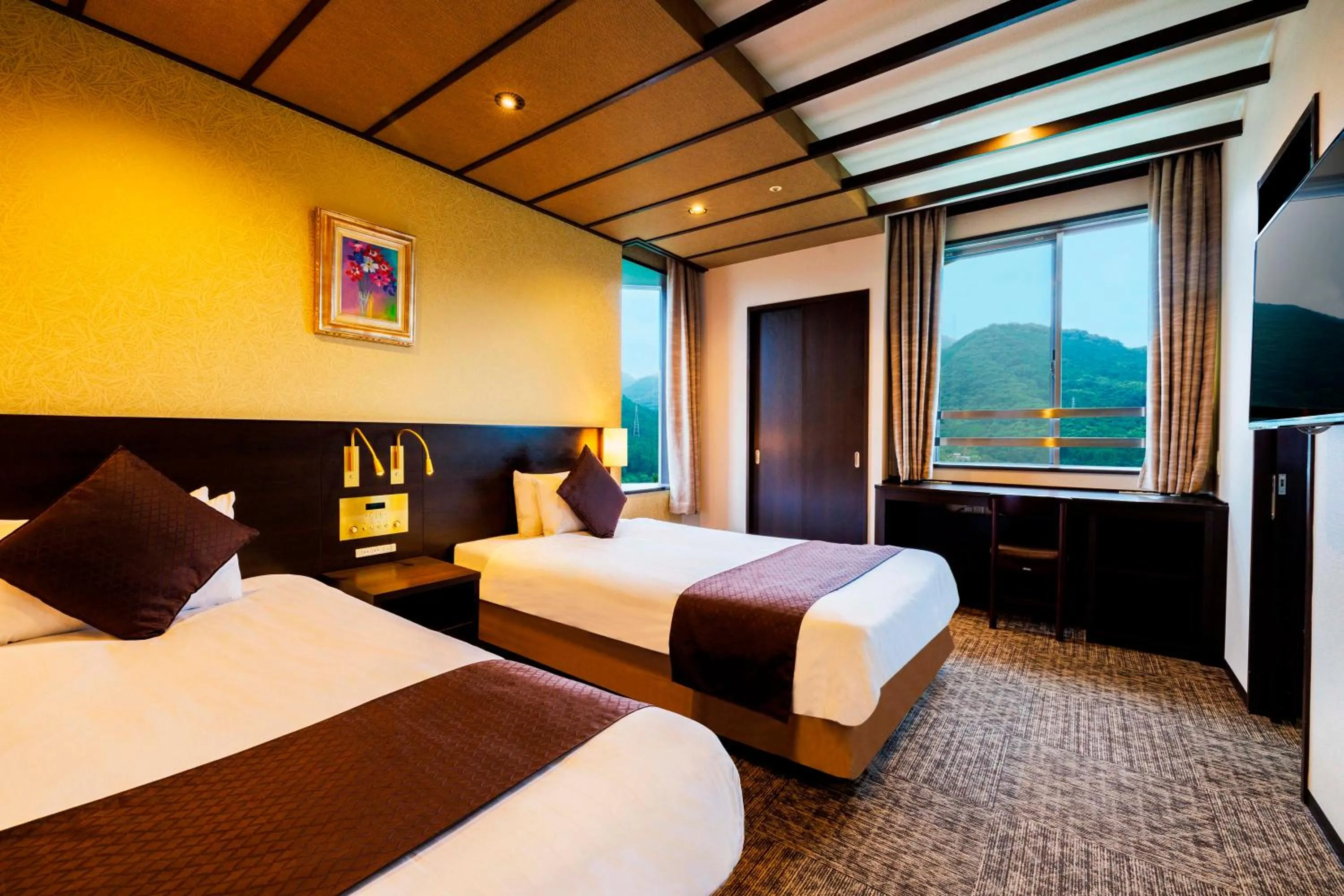 Photo of the whole room, Bed in KAMENOI HOTEL Nagatoro Yorii