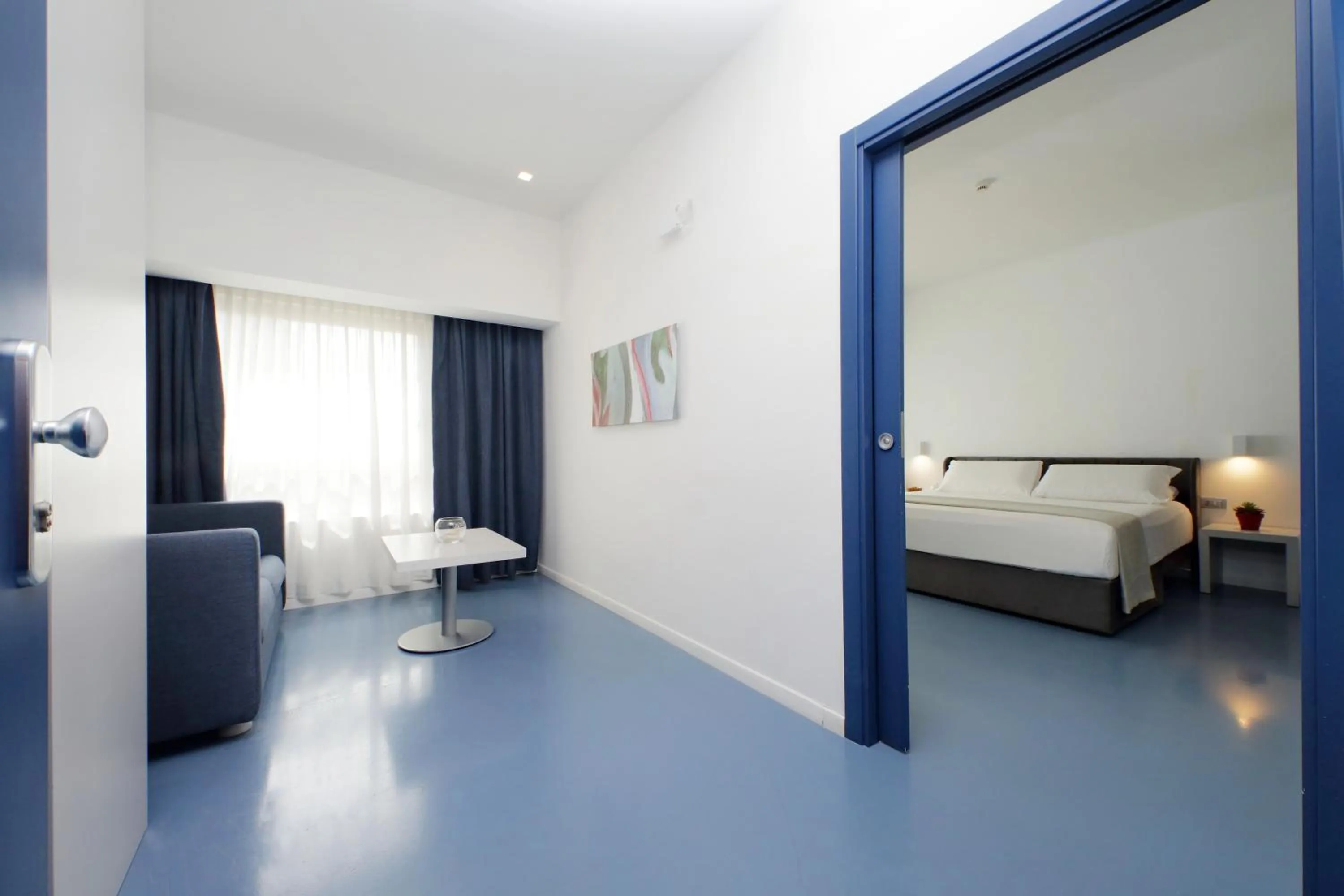 Bed in Hotel Poseidon