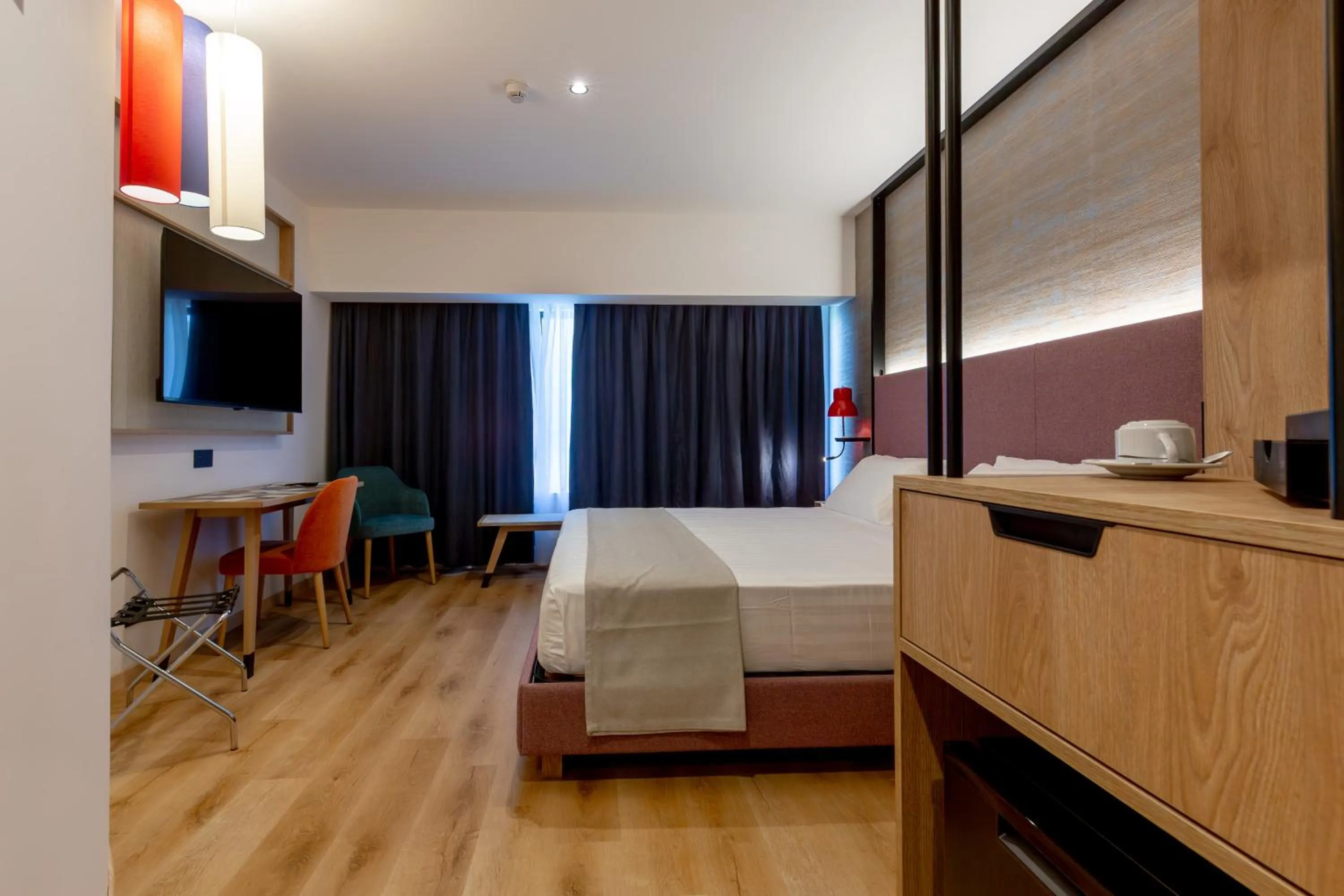 Bed in Hotel Poseidon