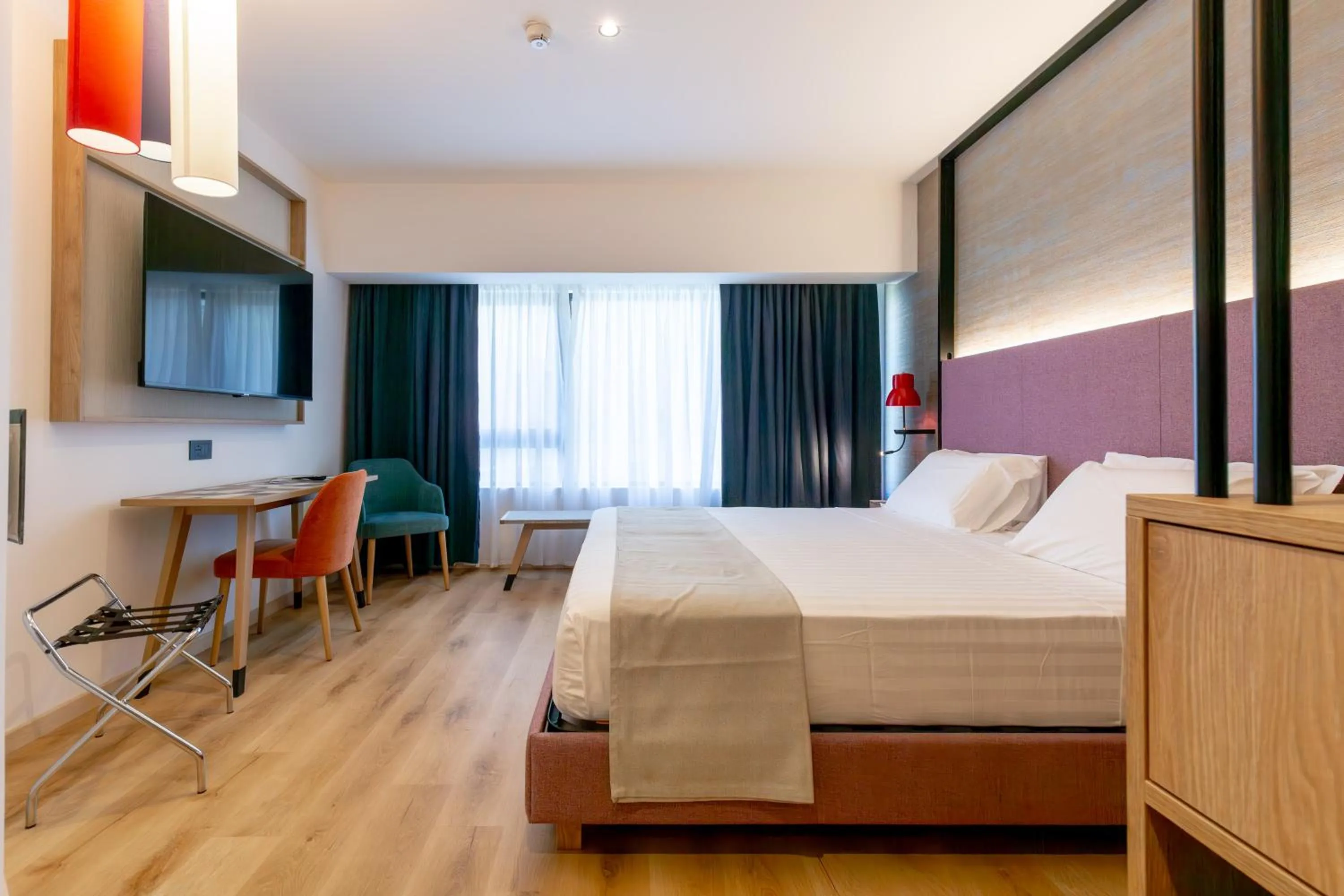 Bed in Hotel Poseidon