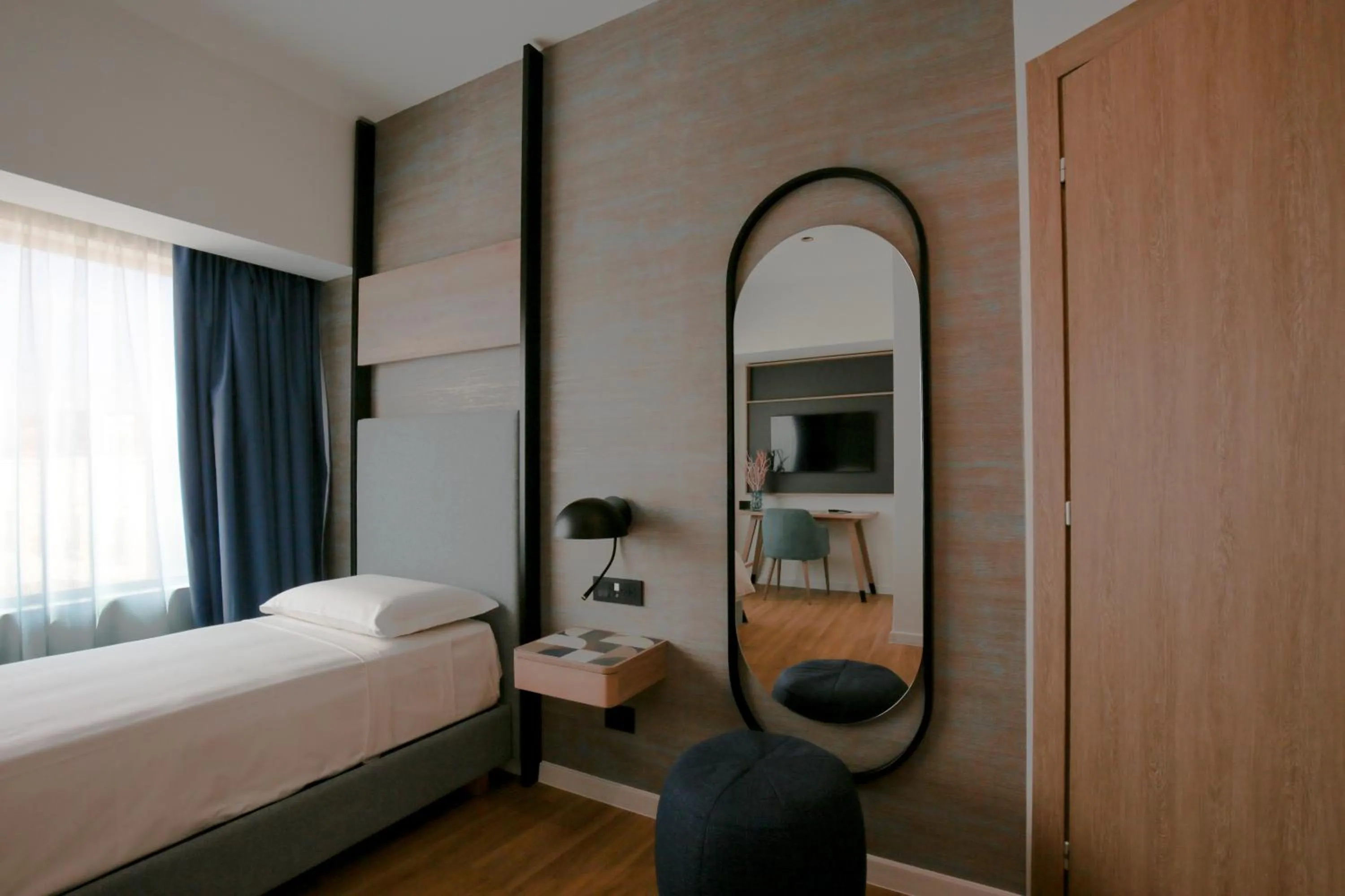 Bed in Hotel Poseidon