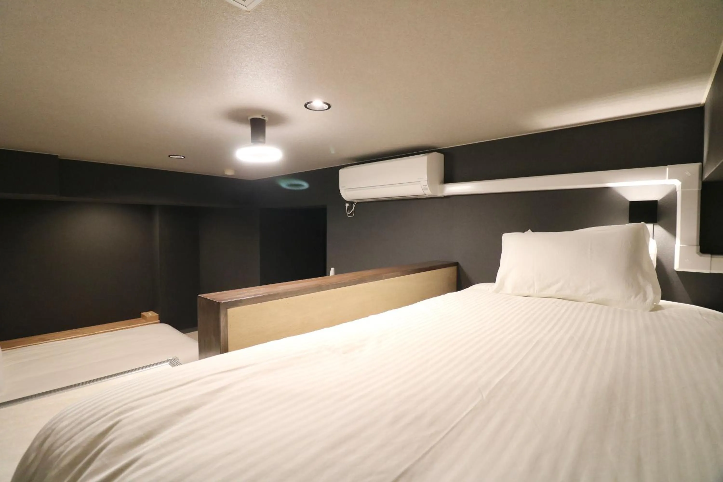 Bed in Maison Sapporo