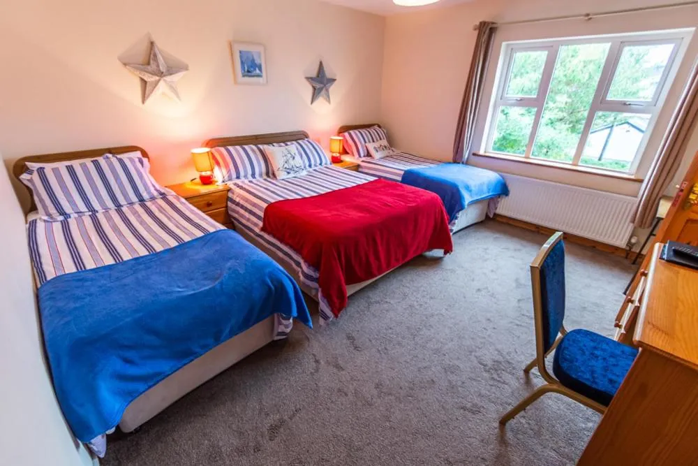 Bed in Seawinds Bed and Breakfast