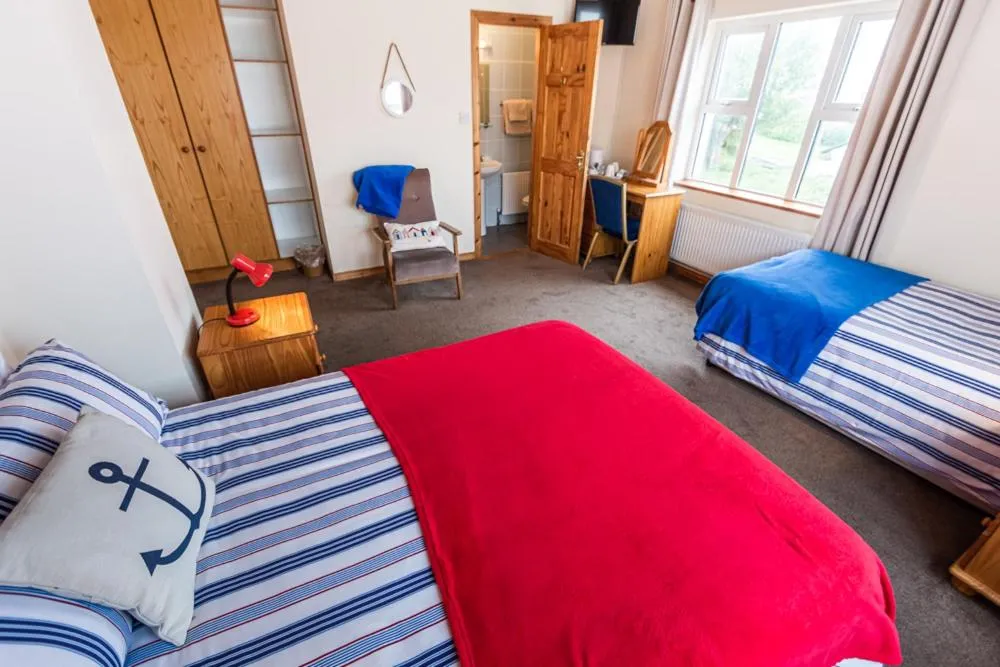 Bed in Seawinds Bed and Breakfast