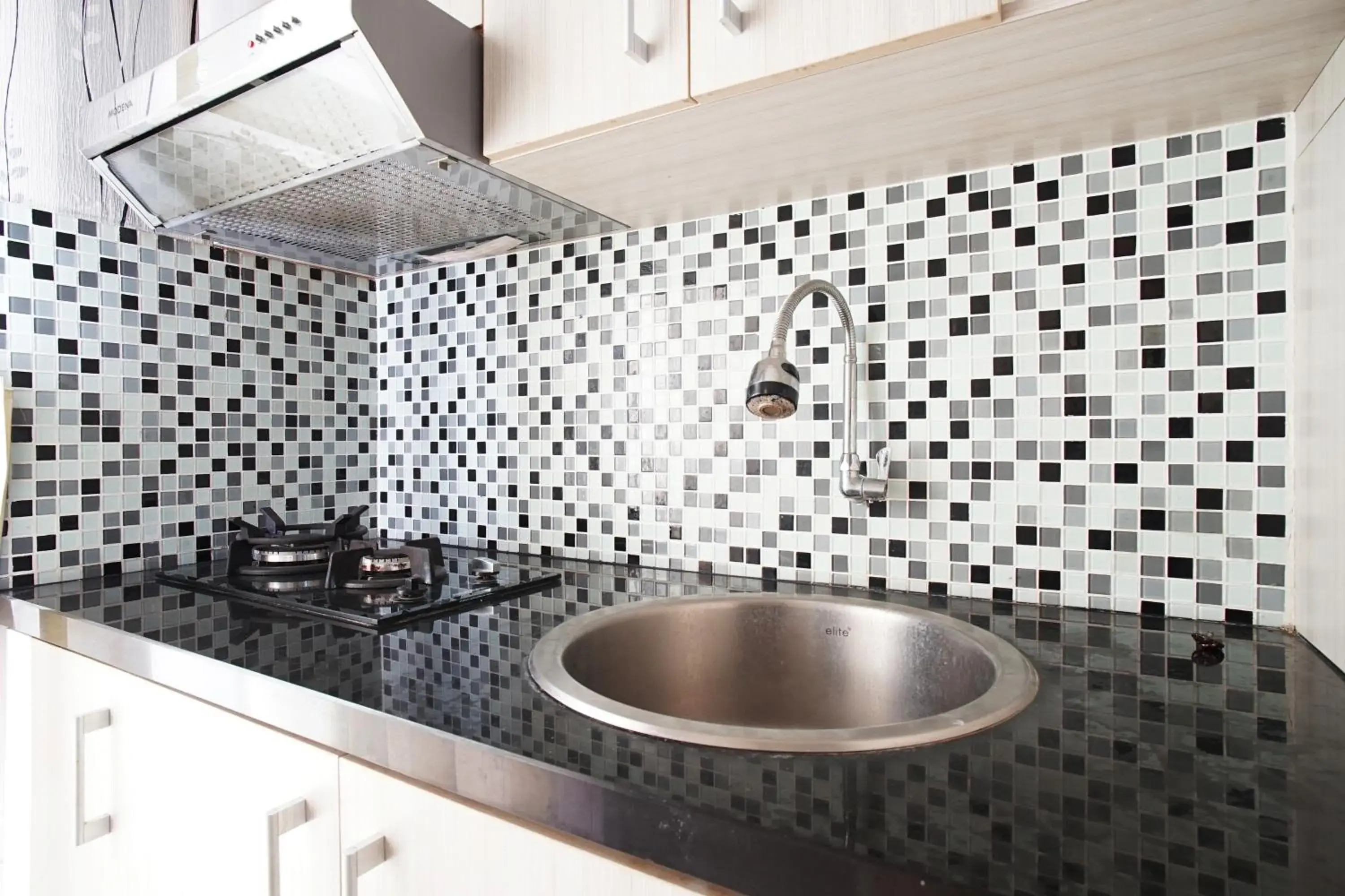 Kitchen or kitchenette in Planet Room Kemang View Kitchen or kitchenette in Planet Room Kemang View