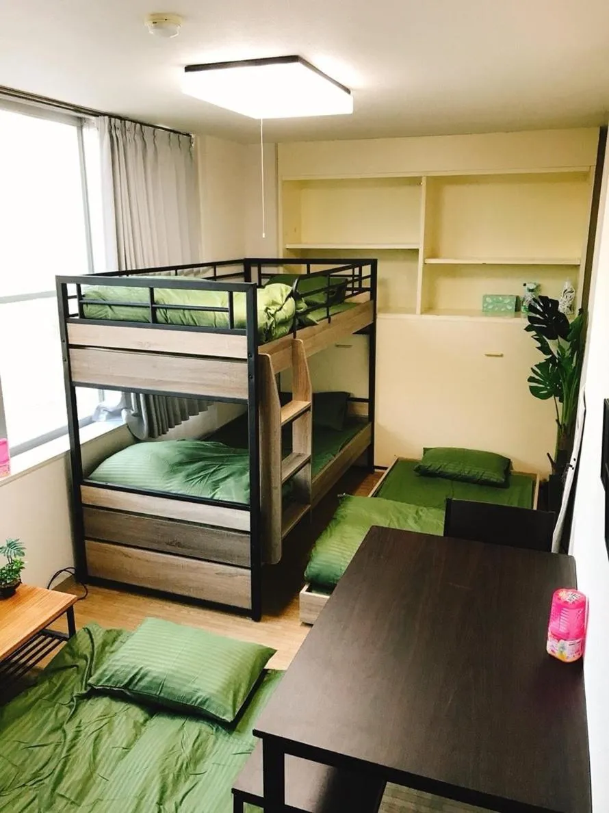 Bed in Joinus Ise Apartment by Tranova