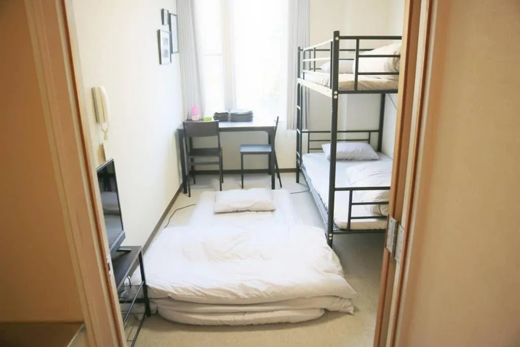 Bed in Joinus Ise Apartment by Tranova