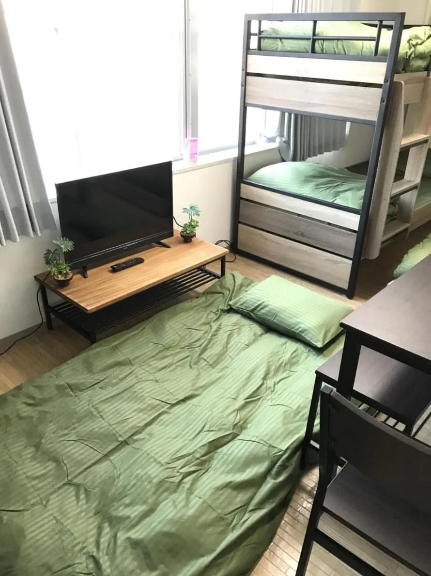 Bed in Joinus Ise Apartment by Tranova