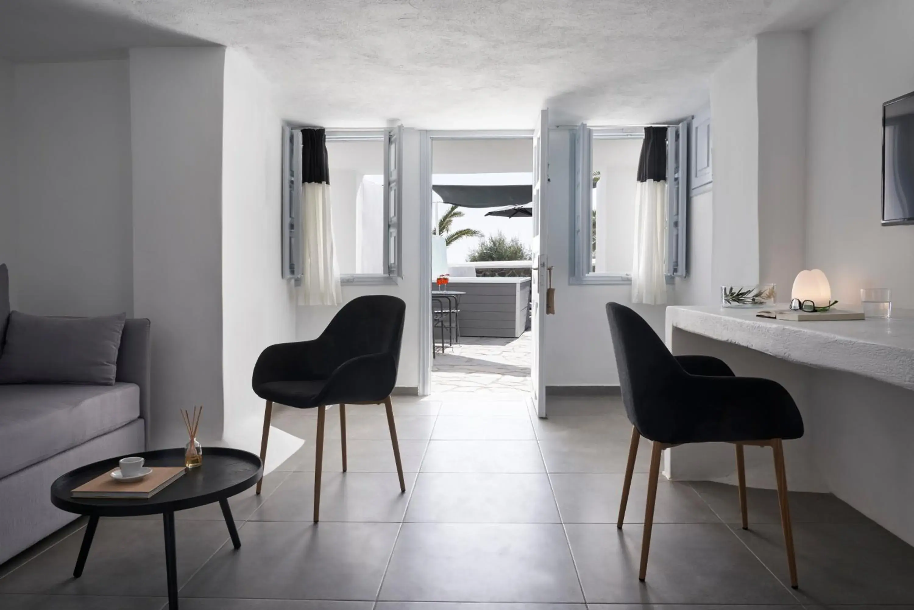 Living room in Mr and Mrs White Oia - Santorini Living room in Mr and Mrs White Oia - Santorini