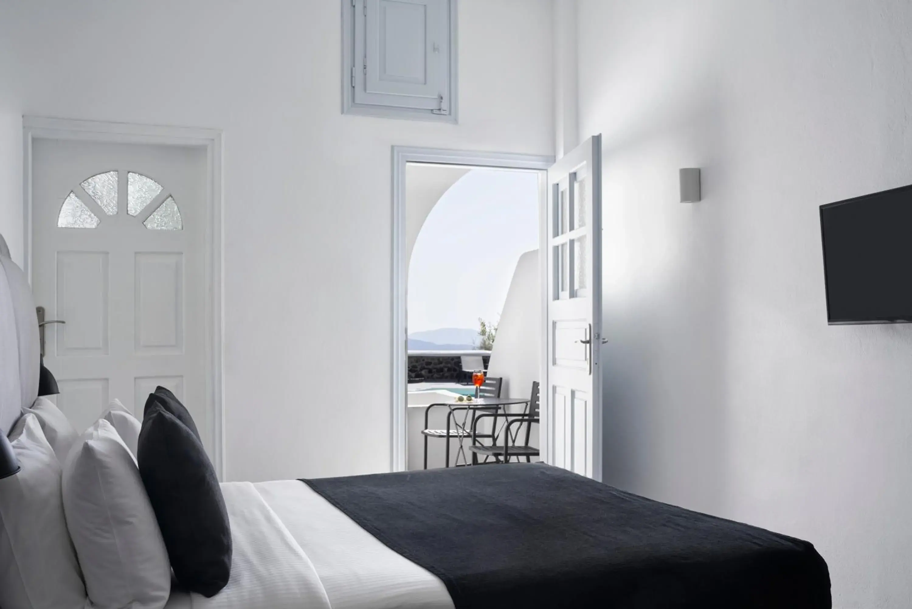 Bedroom, Bed in Mr and Mrs White Oia - Santorini Bedroom, Bed in Mr and Mrs White Oia - Santorini