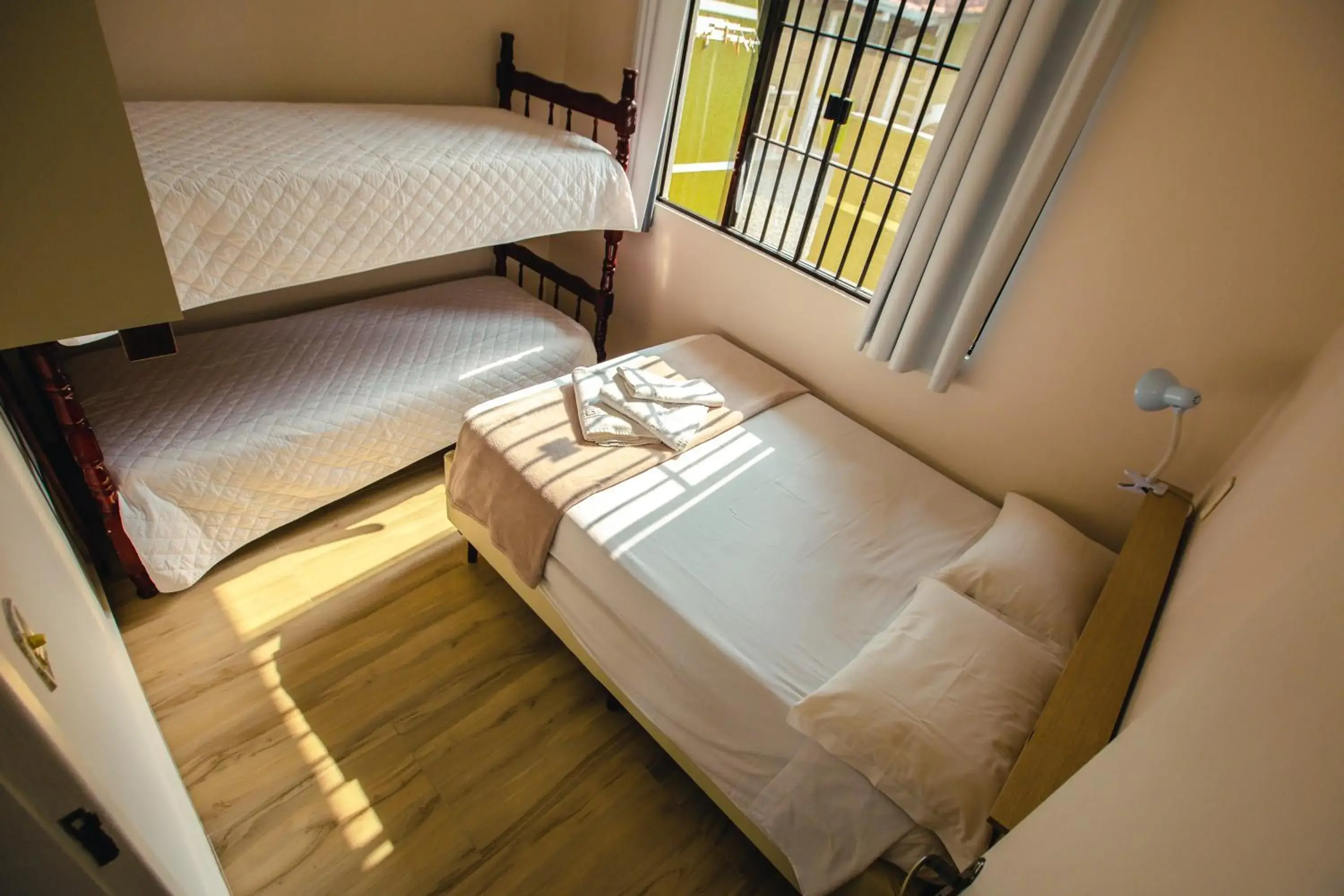 Bed in ApartPousada Residencial dos Reis Bed in ApartPousada Residencial dos Reis