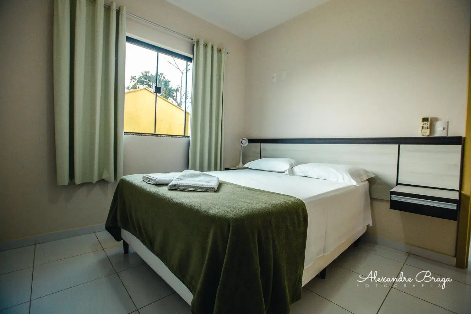 Bed in ApartPousada Residencial dos Reis Bed in ApartPousada Residencial dos Reis