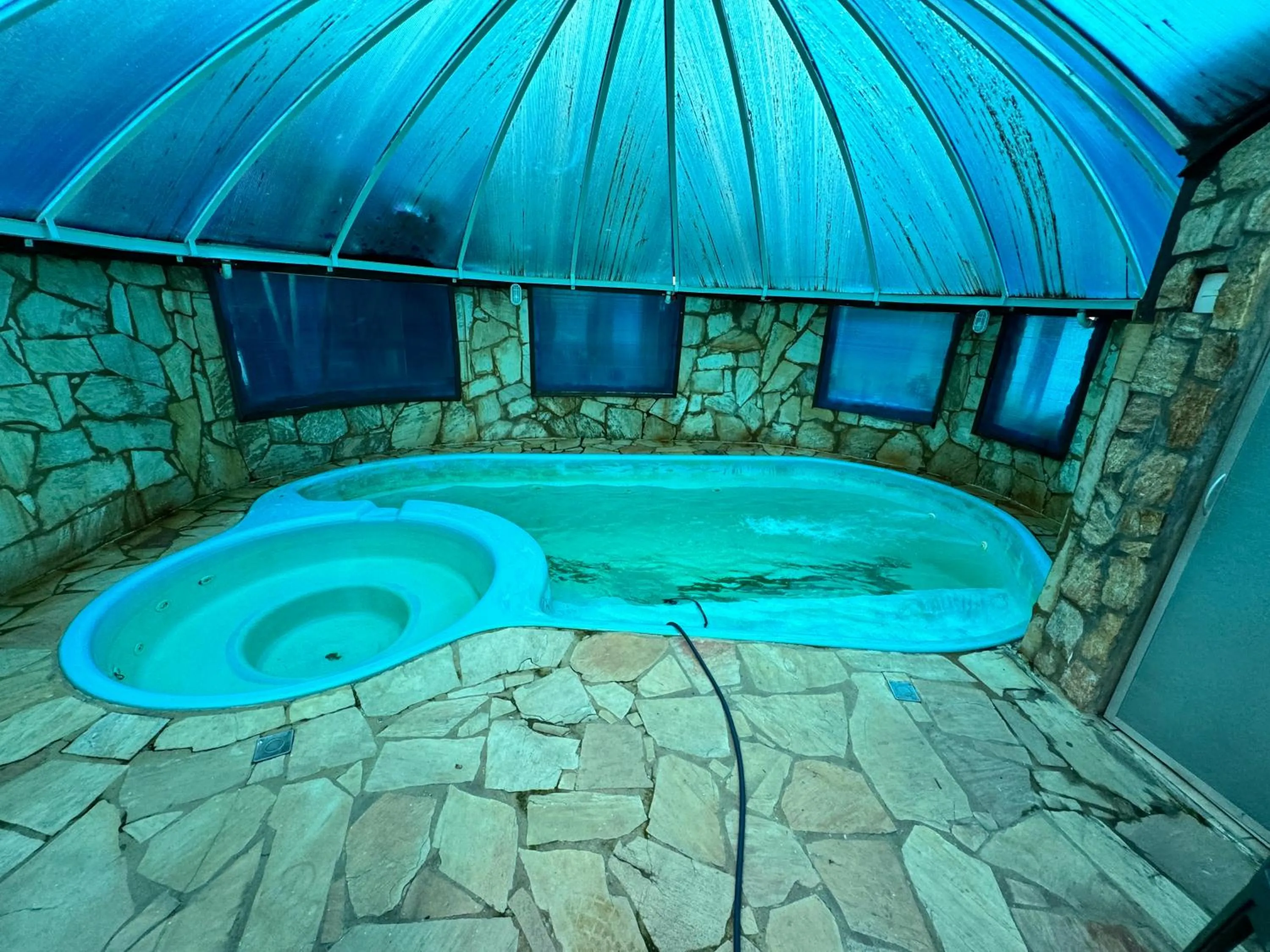 Swimming pool in Pousada Vila D' Itália