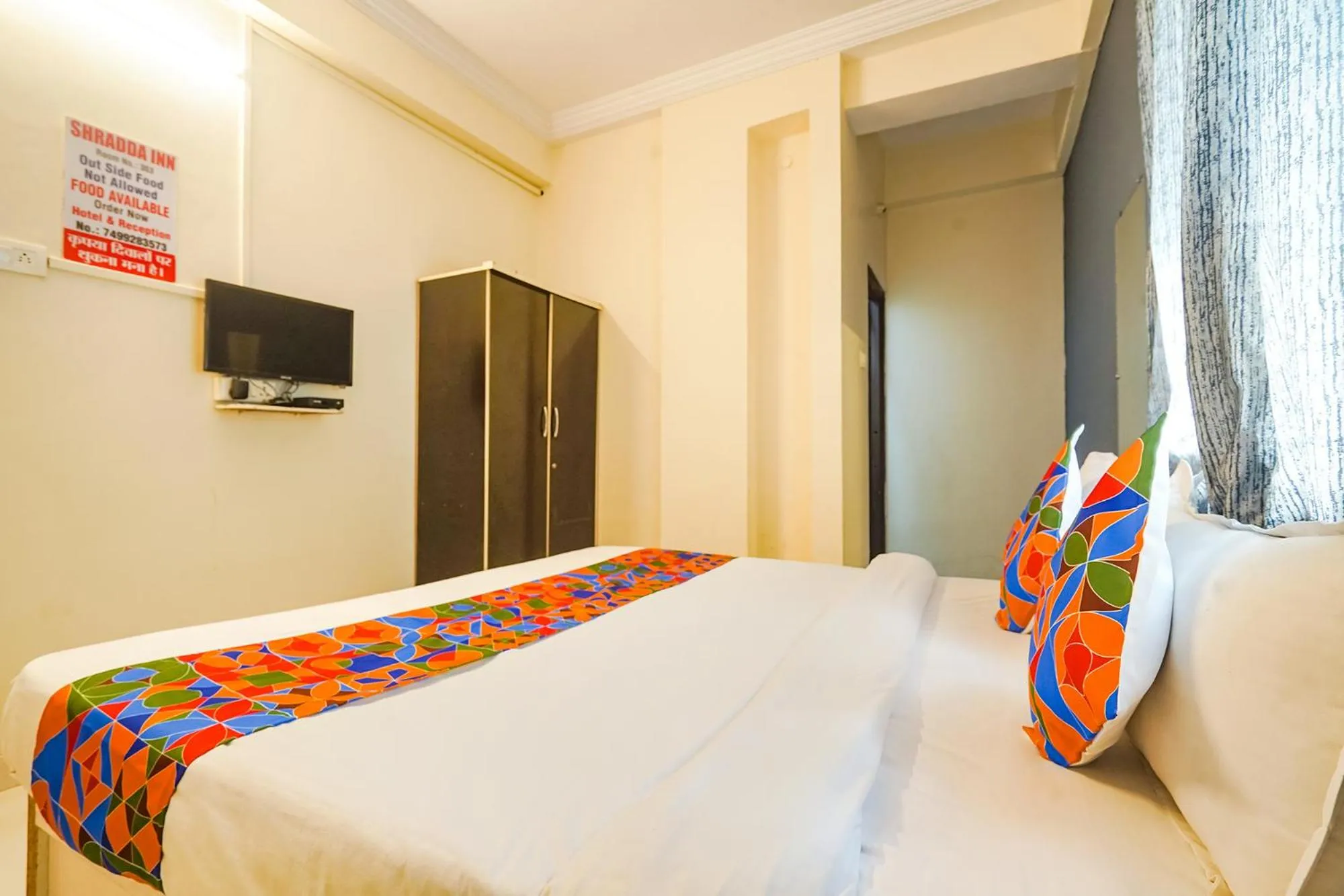 Bed in FabExpress Shraddha inn