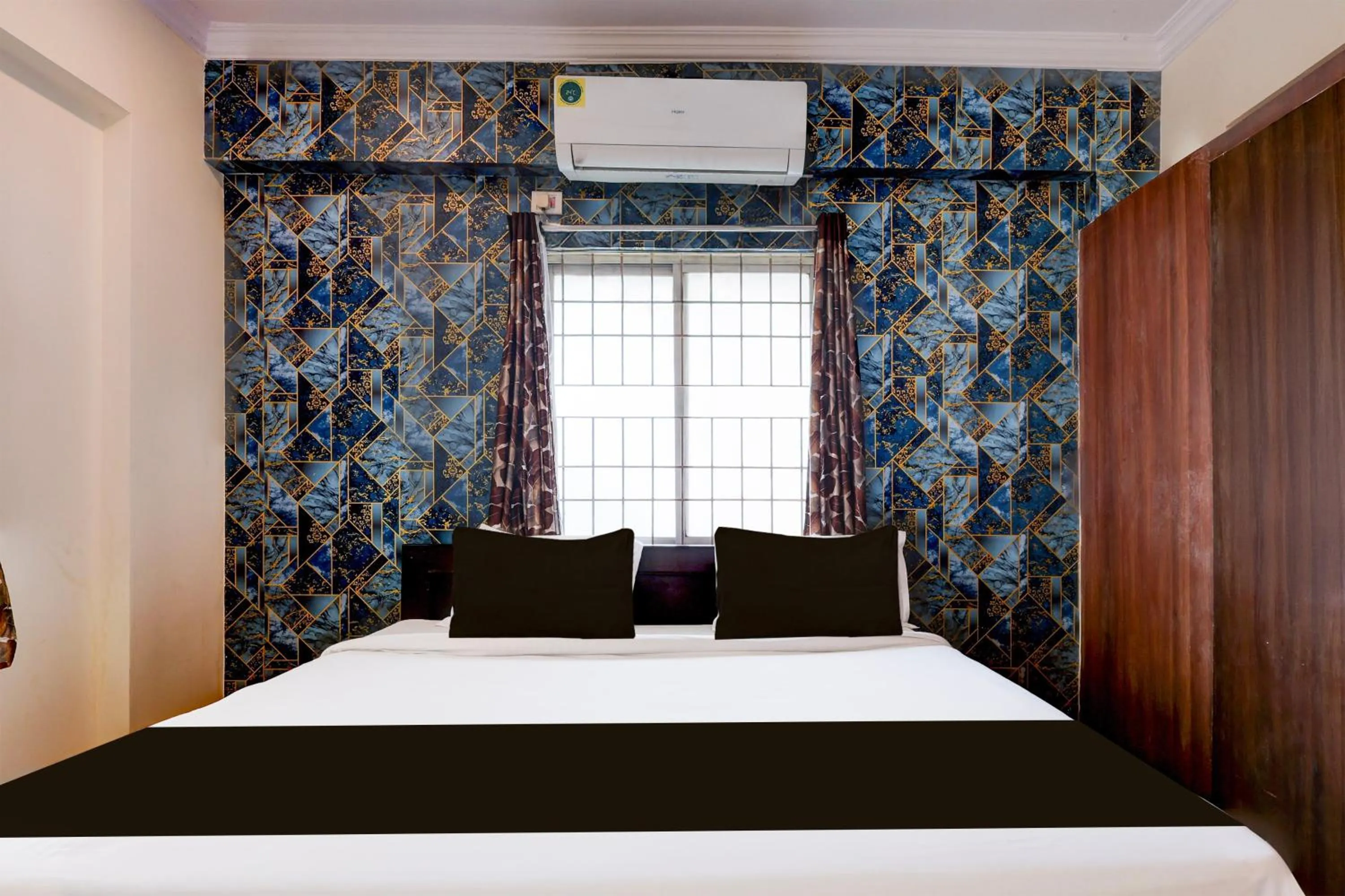 Bedroom, Bed in Super Hotel O Rushikonda Beach