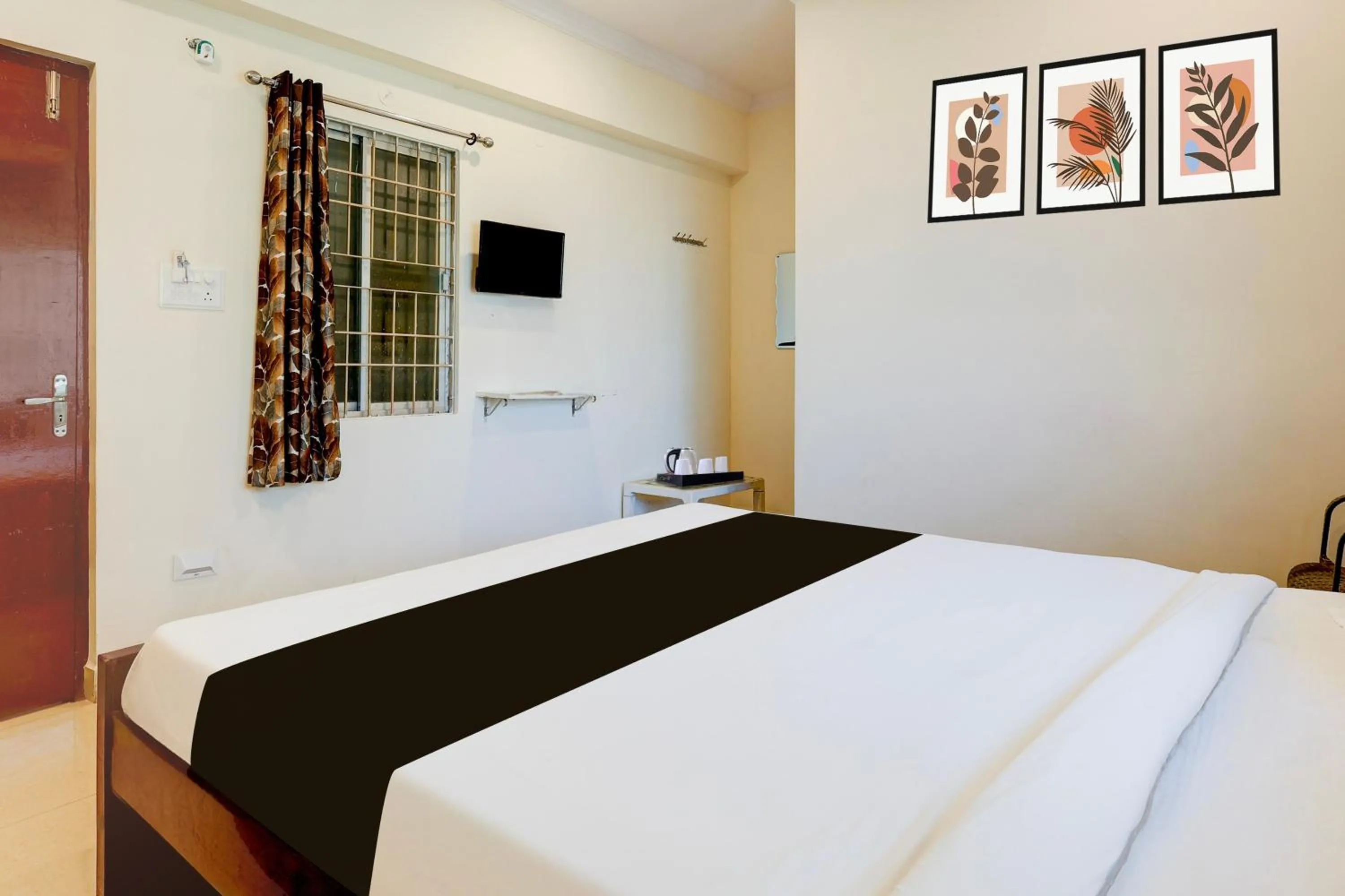 Bedroom, Bed in Super Hotel O Rushikonda Beach