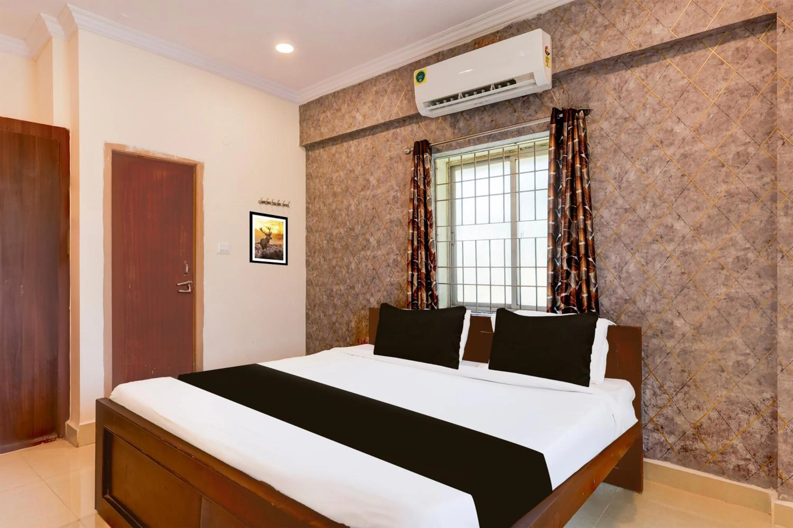 Bedroom, Bed in Super Hotel O Rushikonda Beach