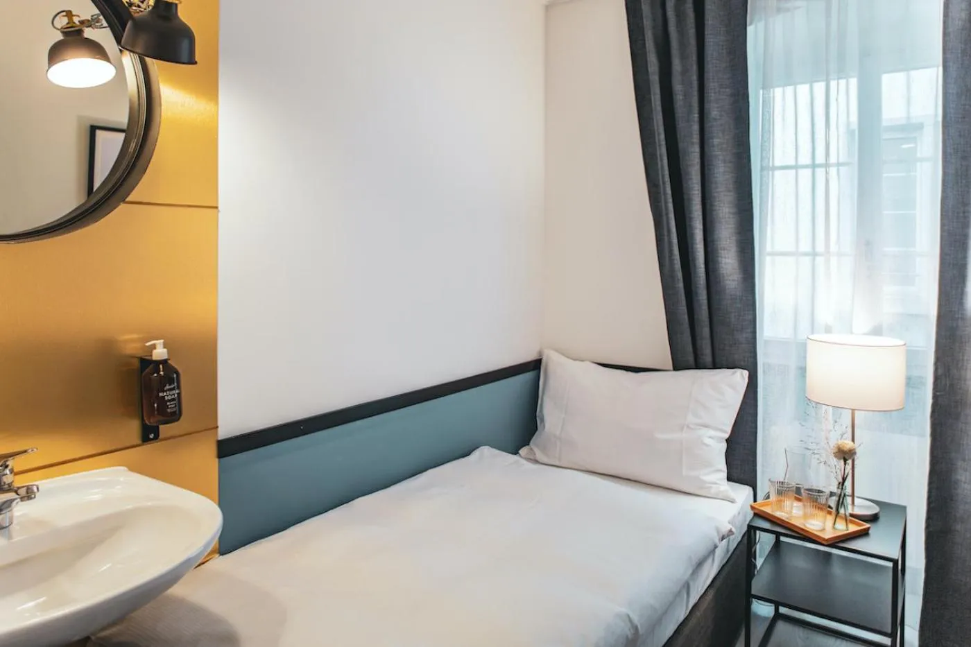 Photo of the whole room, Bed in Pop Up Hotel Krone Zürich