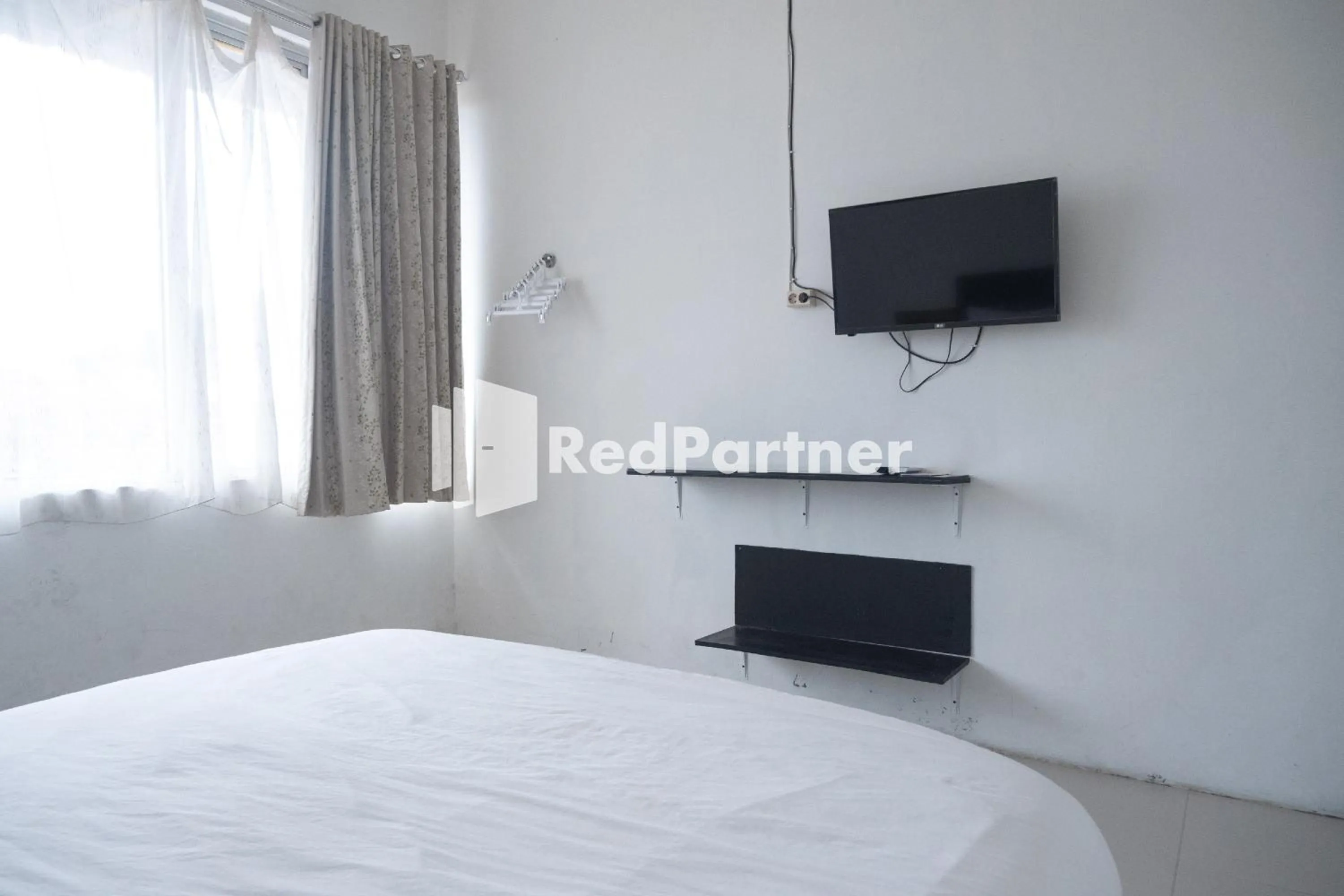 Bedroom, Bed in Homestay C9 Exclusive Kaliurang Yogyakarta Mitra RedDoorz