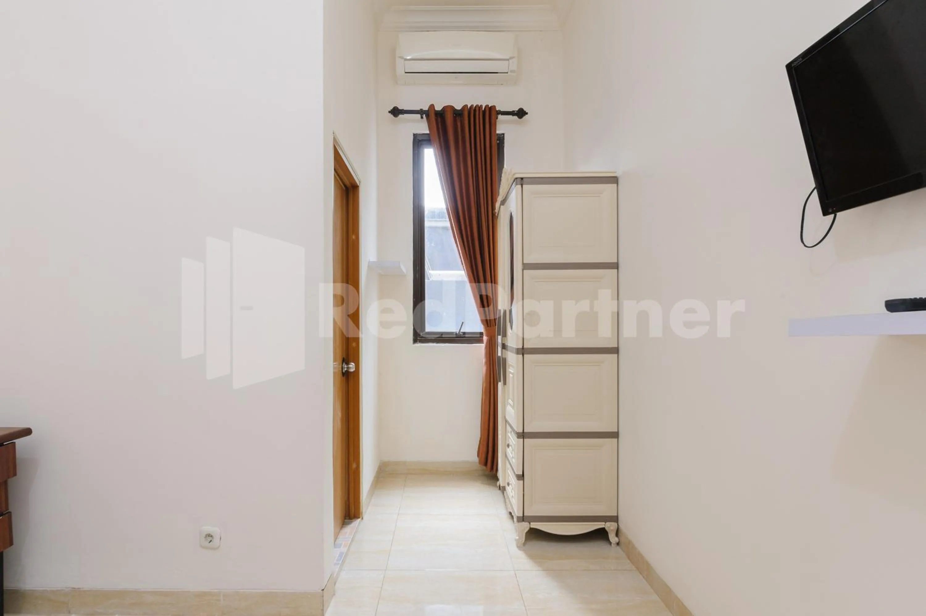 TV and multimedia in Pondok Cimanggu Syariah Mitra RedDoorz