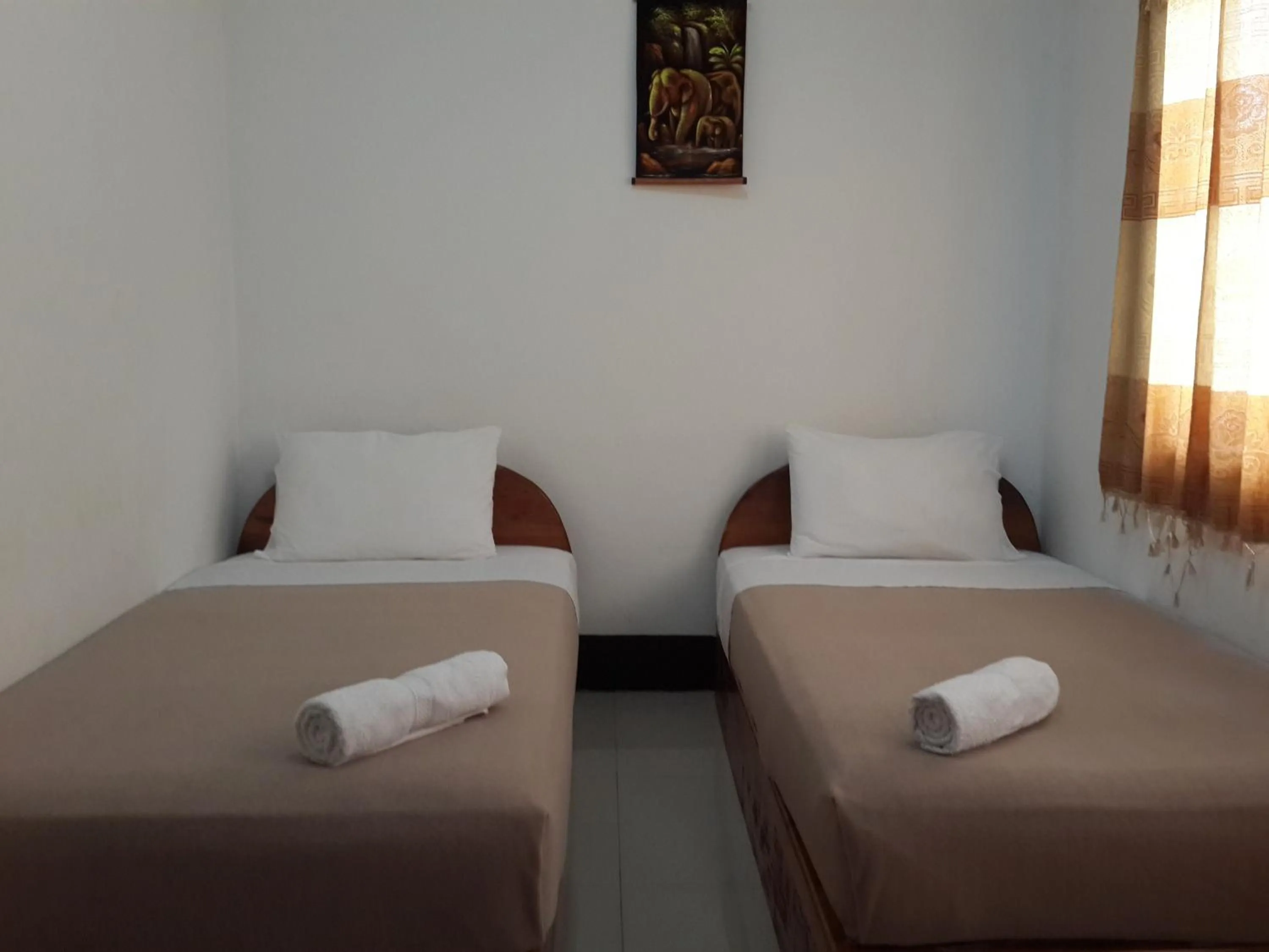 Bed in A Tee Guesthouse