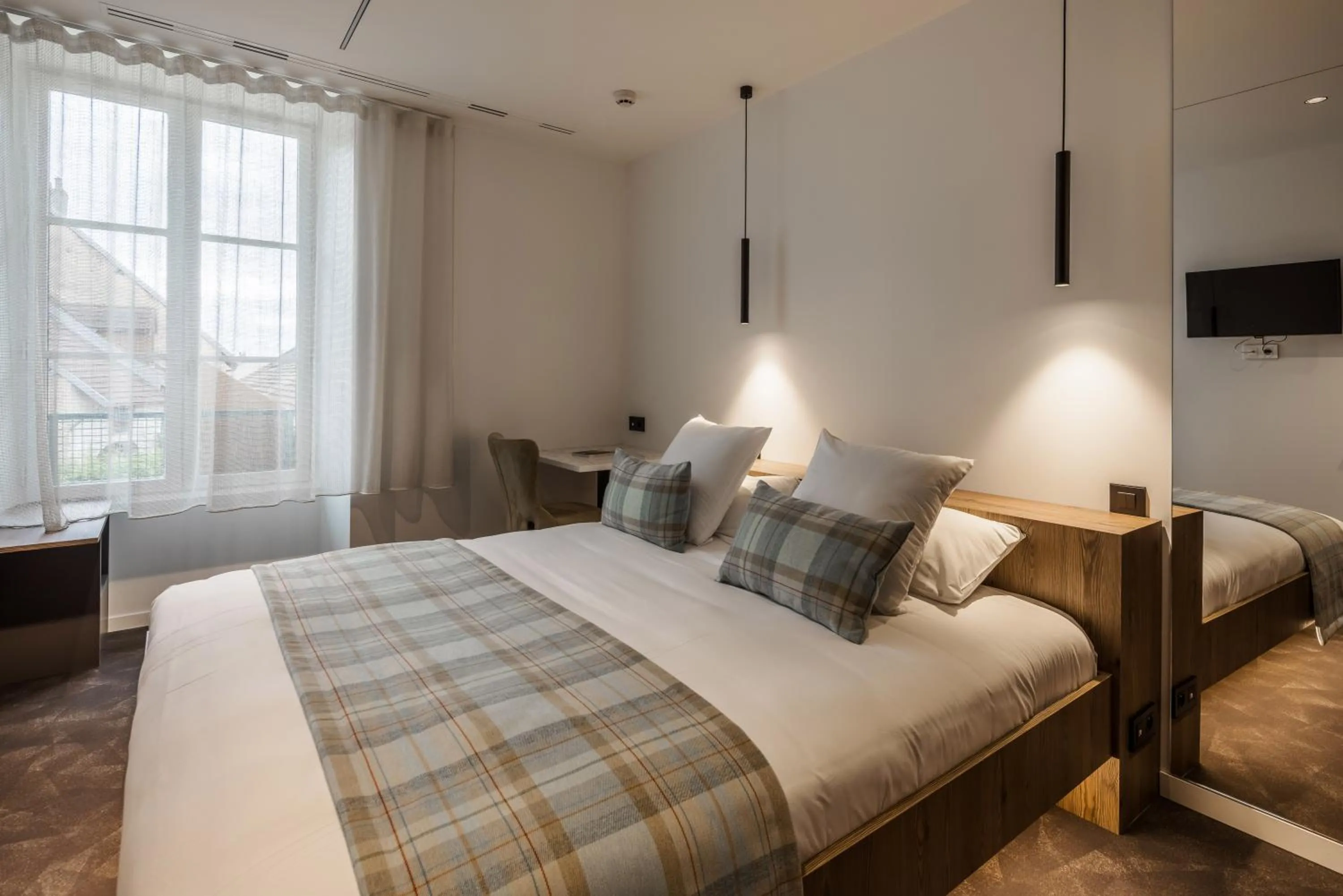 Bed in Logis Hôtel Parenthèse, Restaurant & Spa